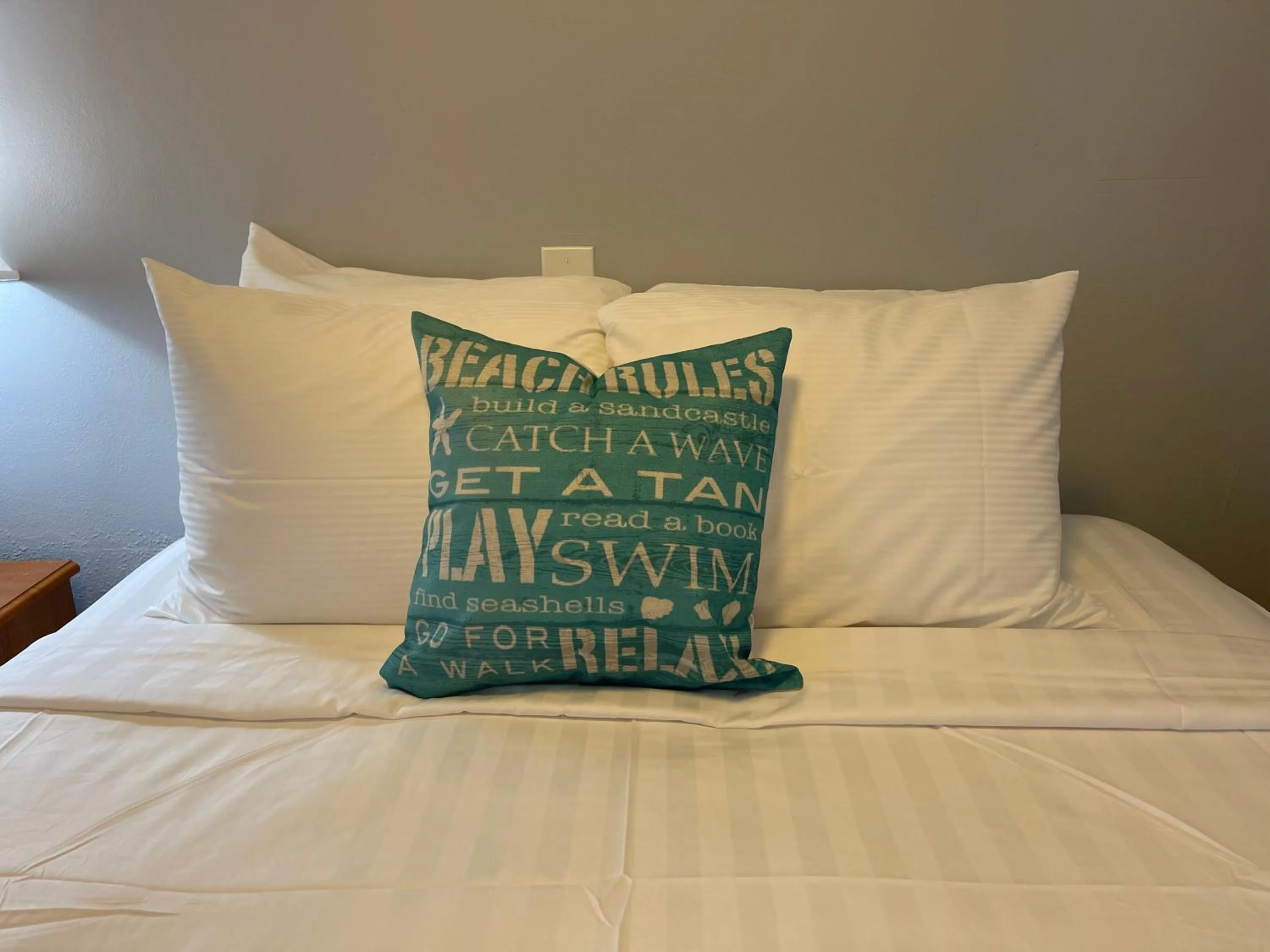 Bed in The Palomar Inn