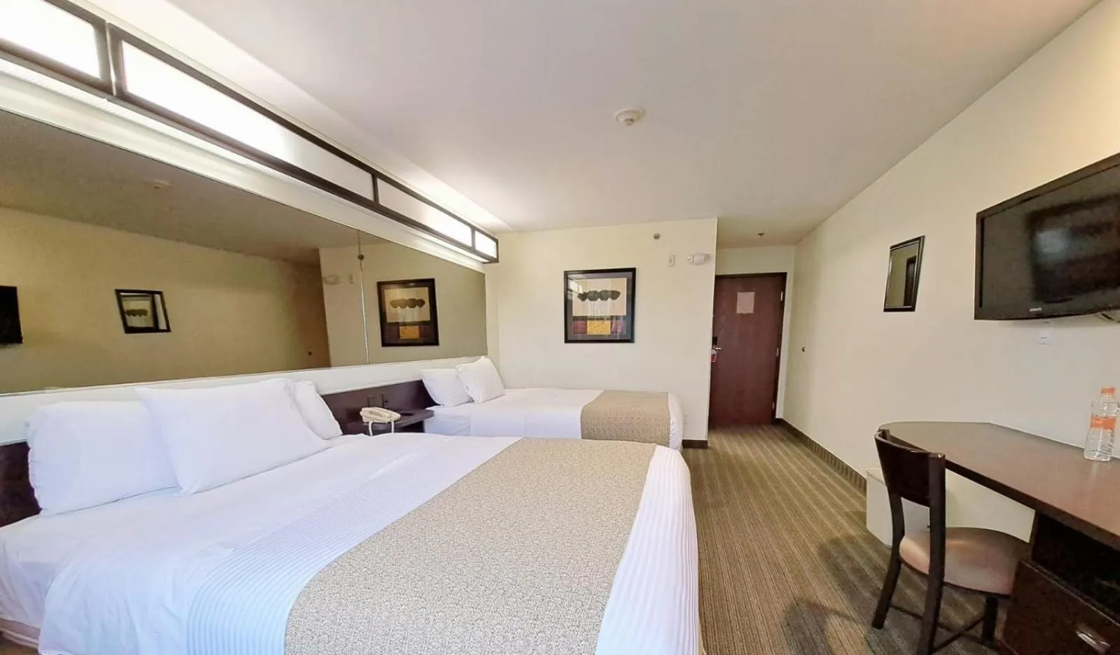 Bed in Microtel Inn and Suites by Wyndham Toluca