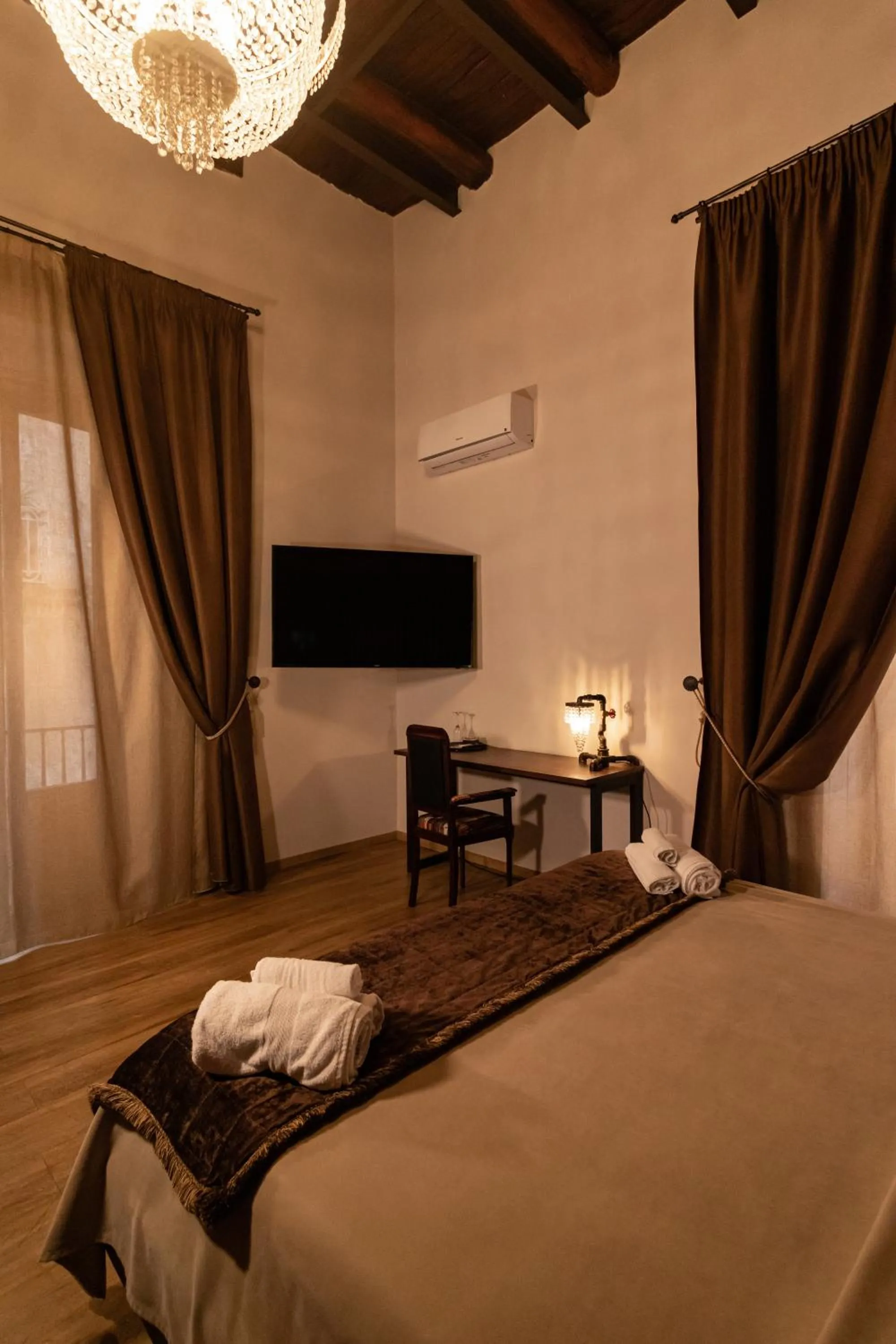 Bed in Duomo Luxury Suites