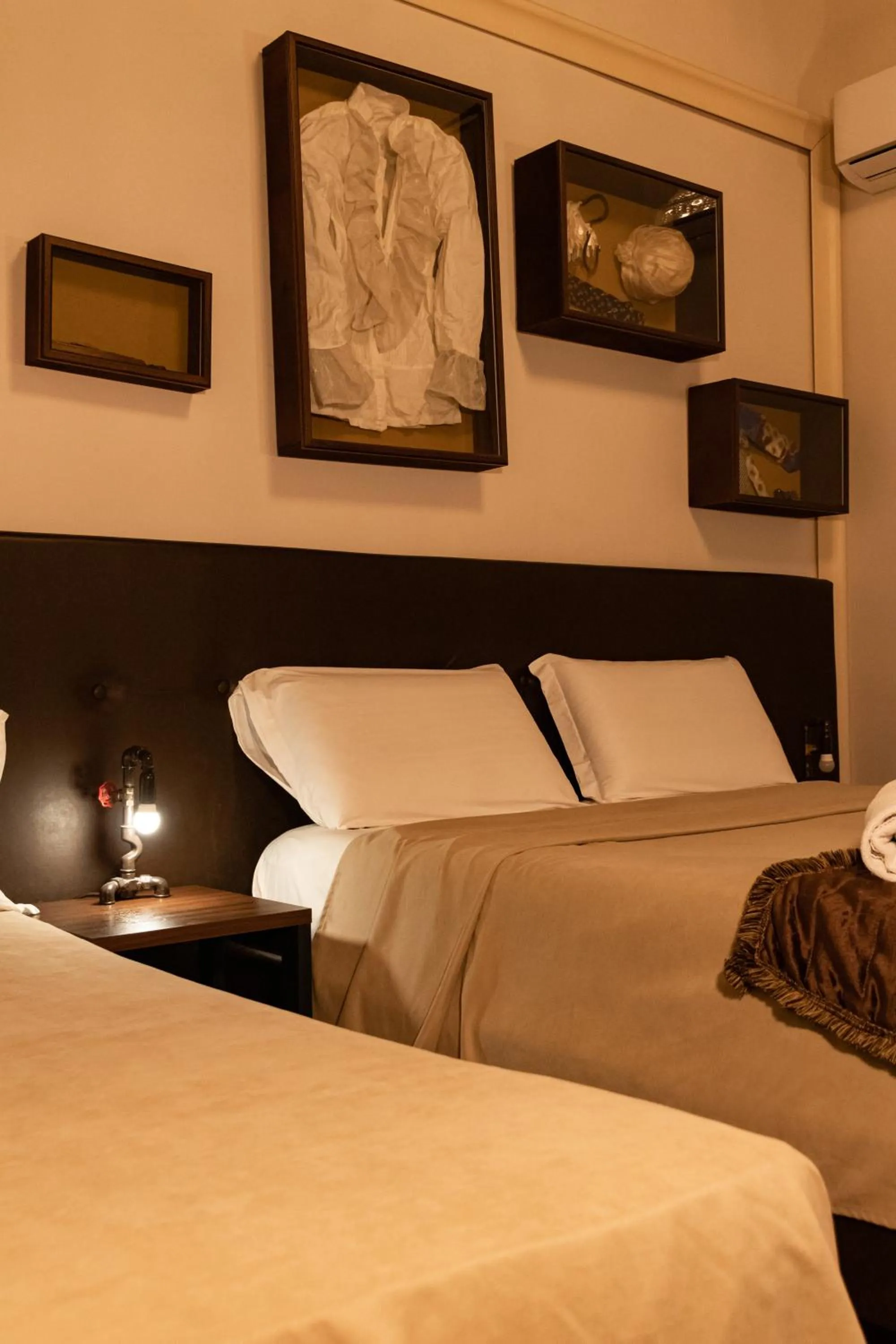Bed in Duomo Luxury Suites