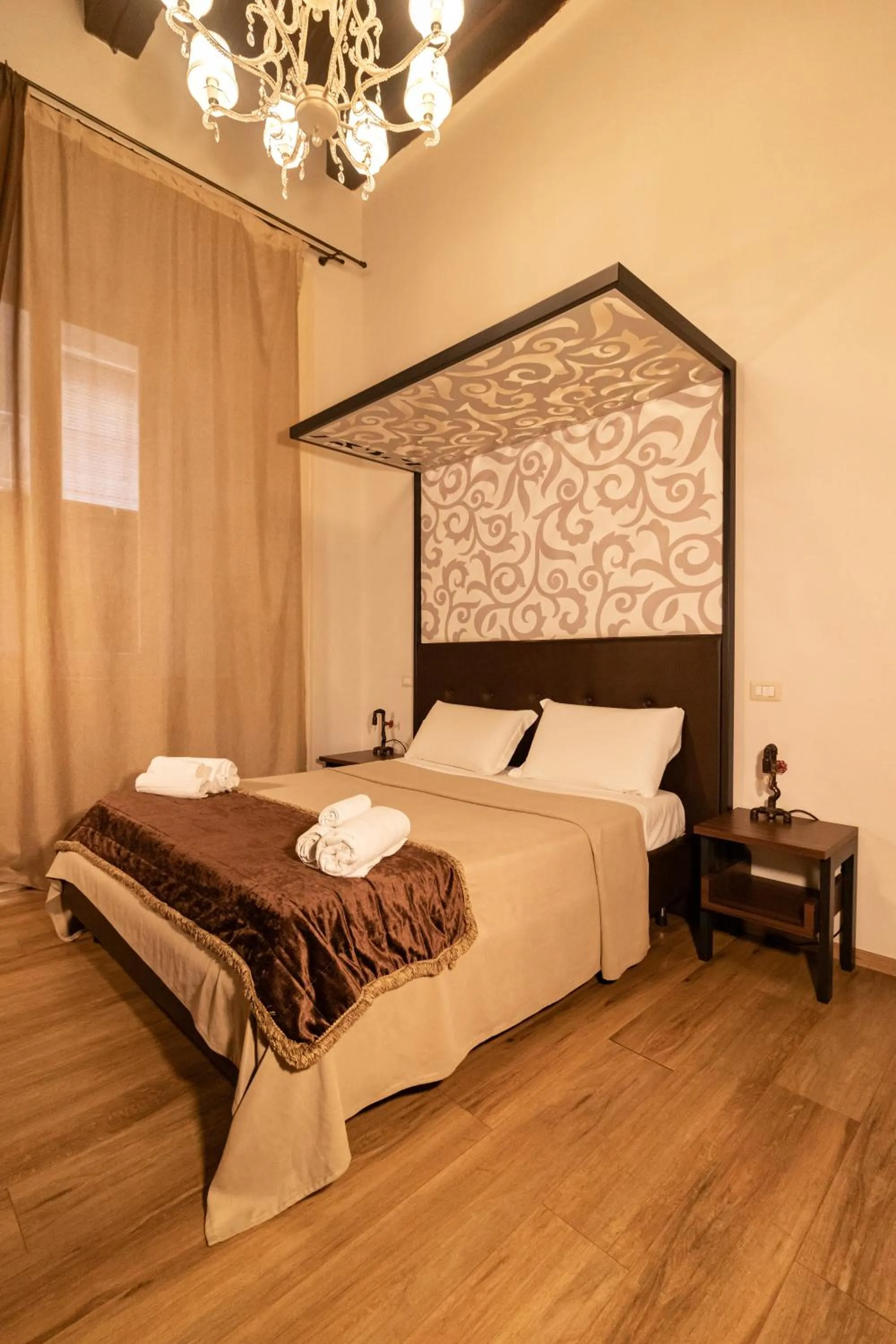 Bed in Duomo Luxury Suites