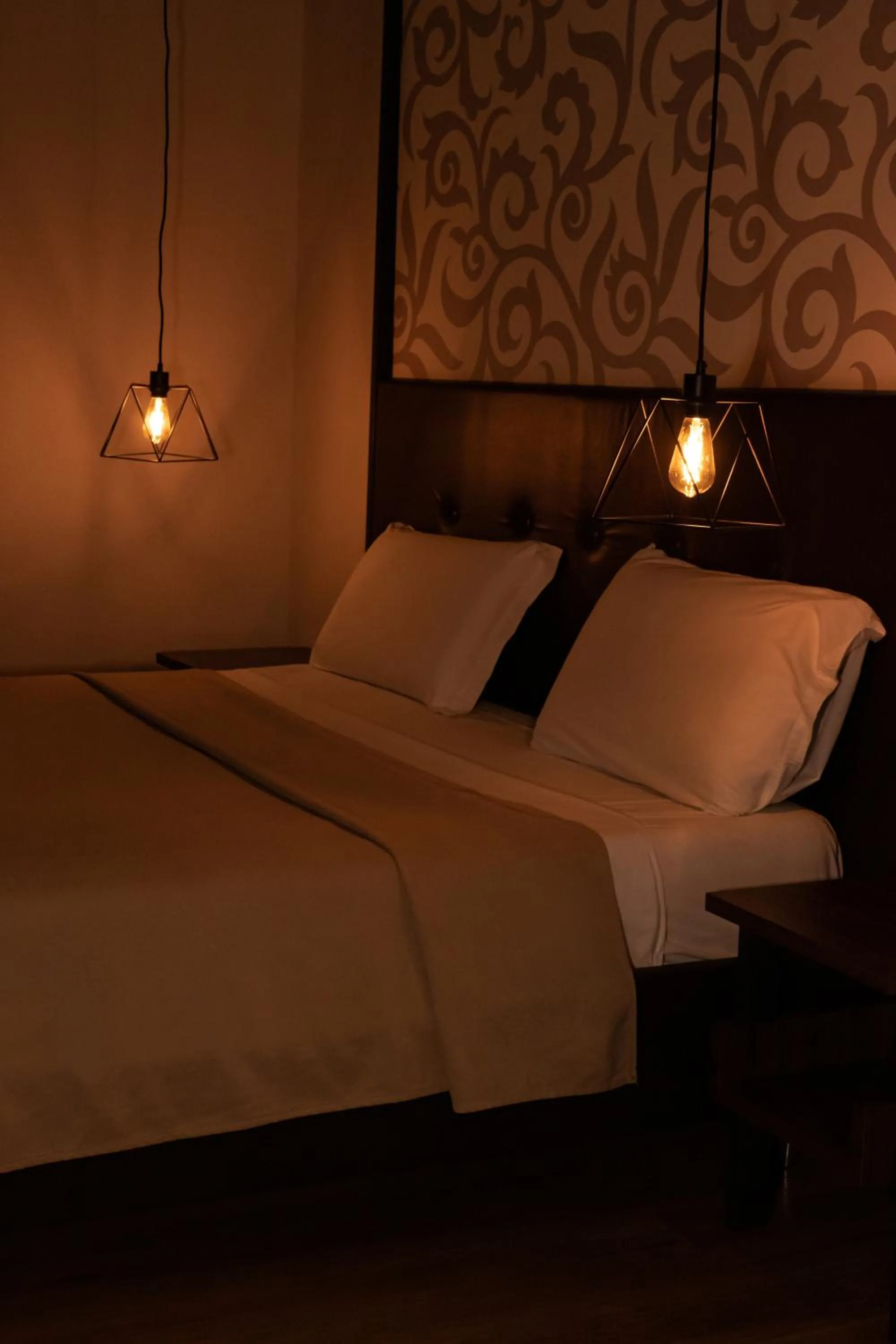 Bed in Duomo Luxury Suites