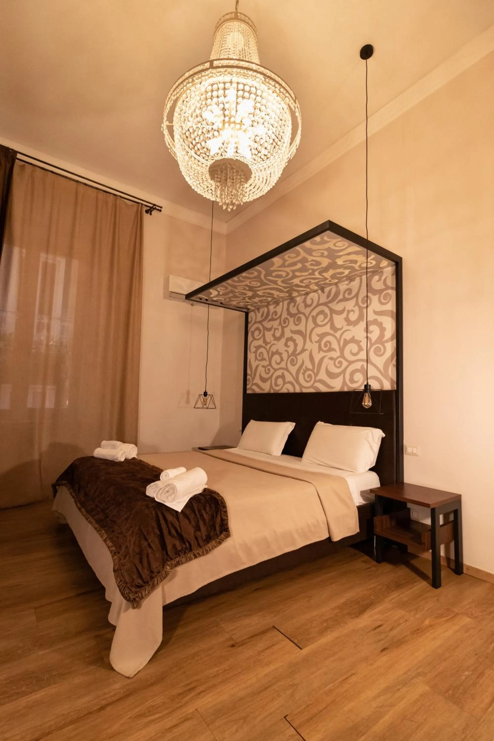 Bed in Duomo Luxury Suites