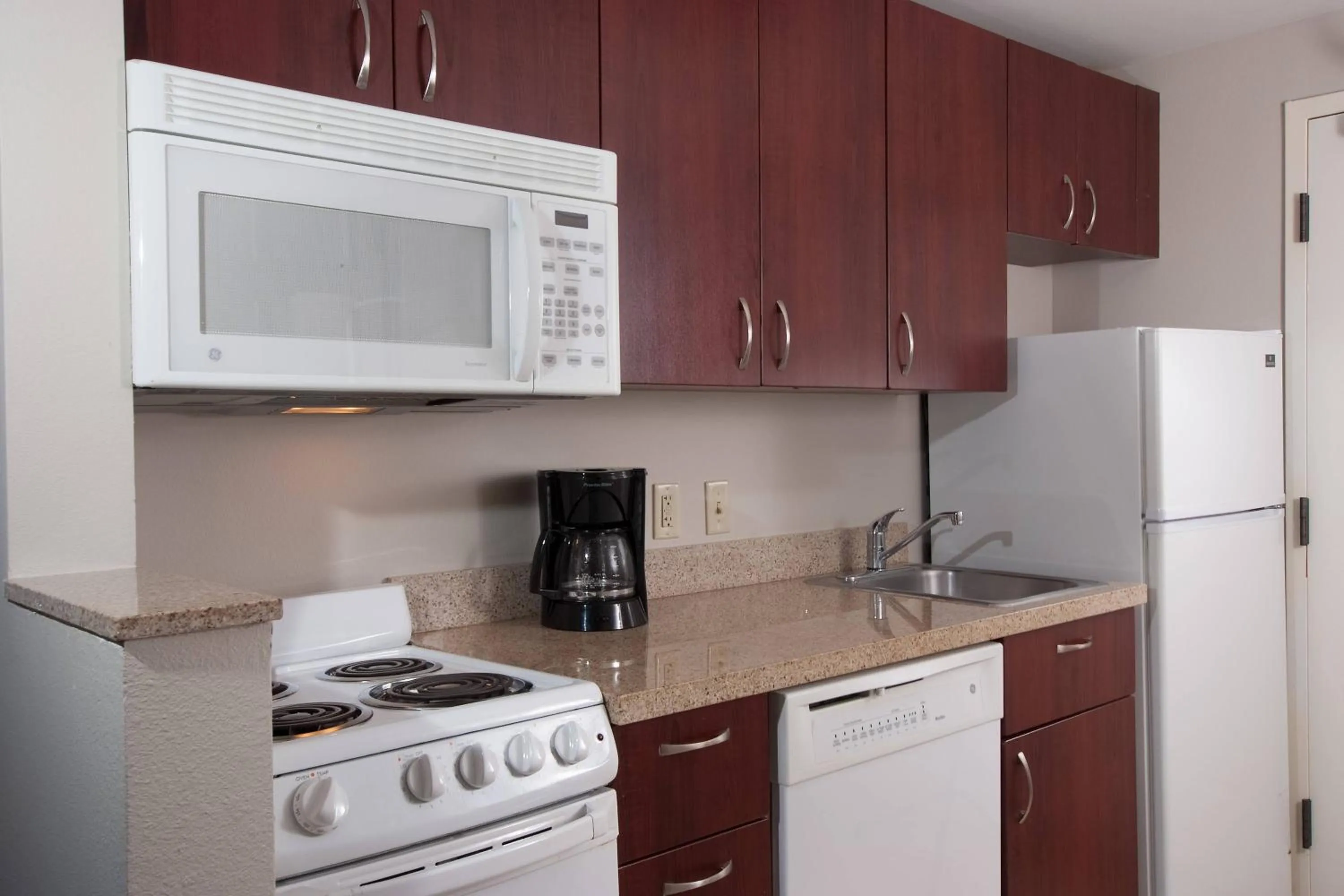 Kitchen or kitchenette in TownePlace Suites The Villages