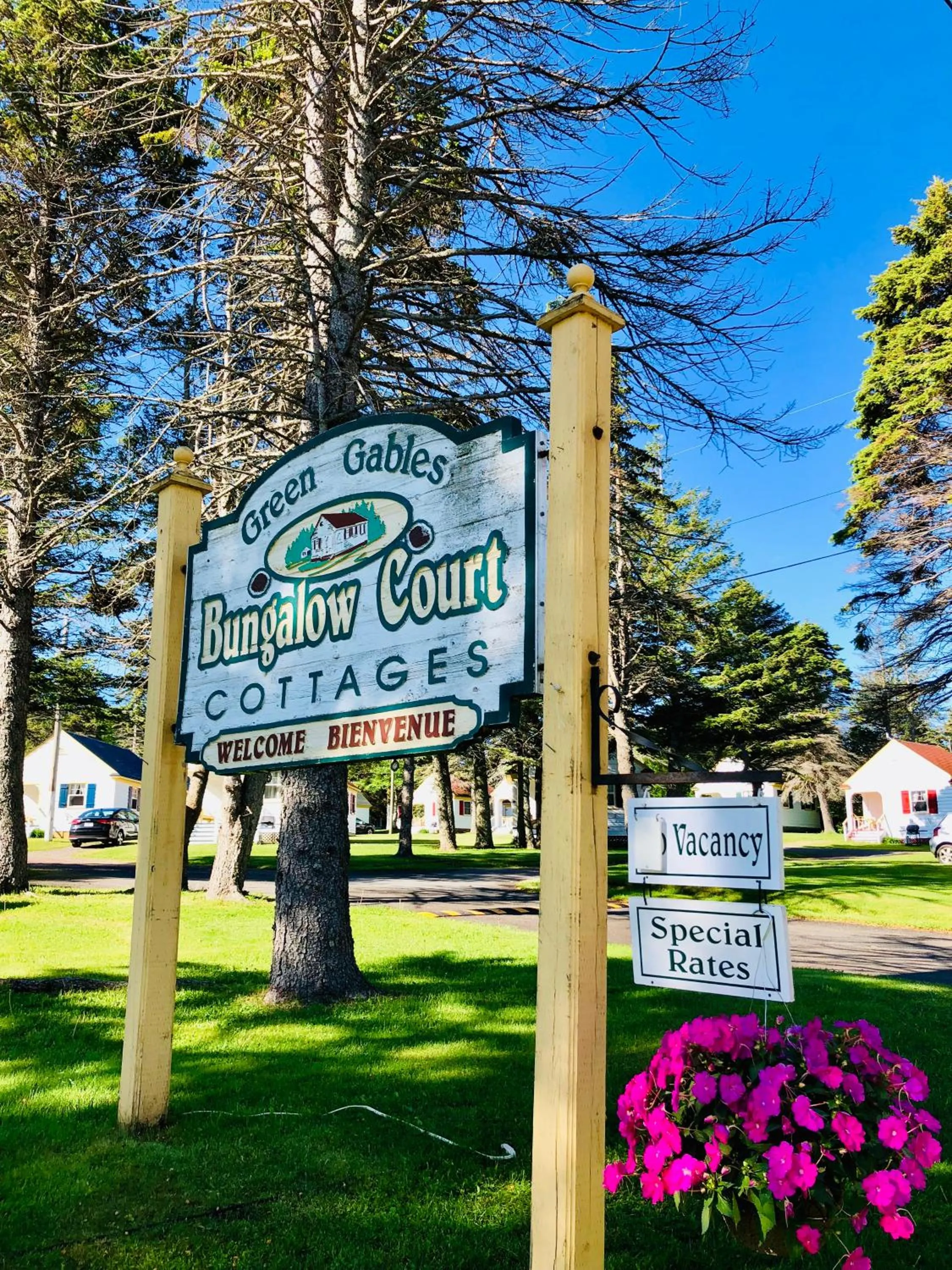 Property logo or sign in Green Gables Bungalow Court