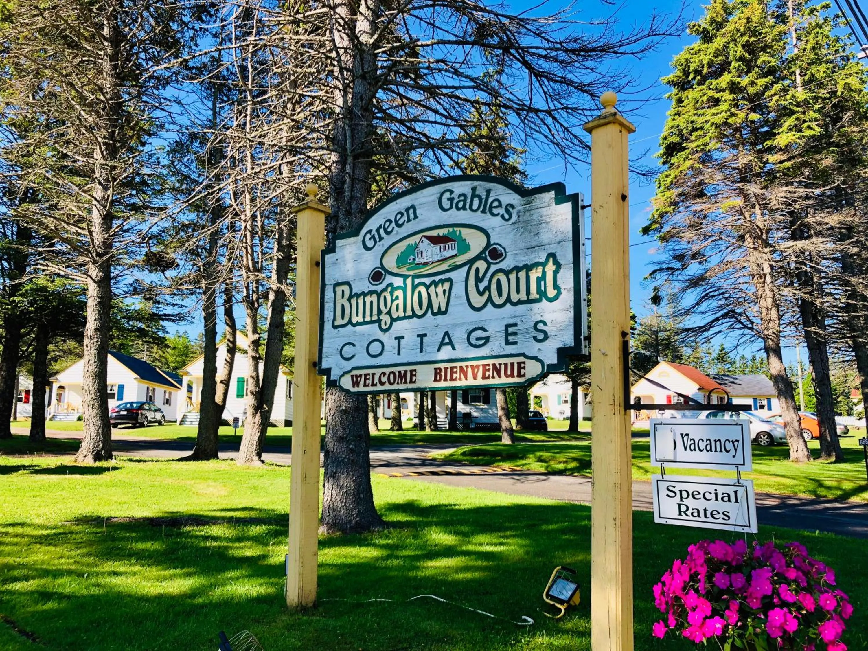 Property logo or sign in Green Gables Bungalow Court