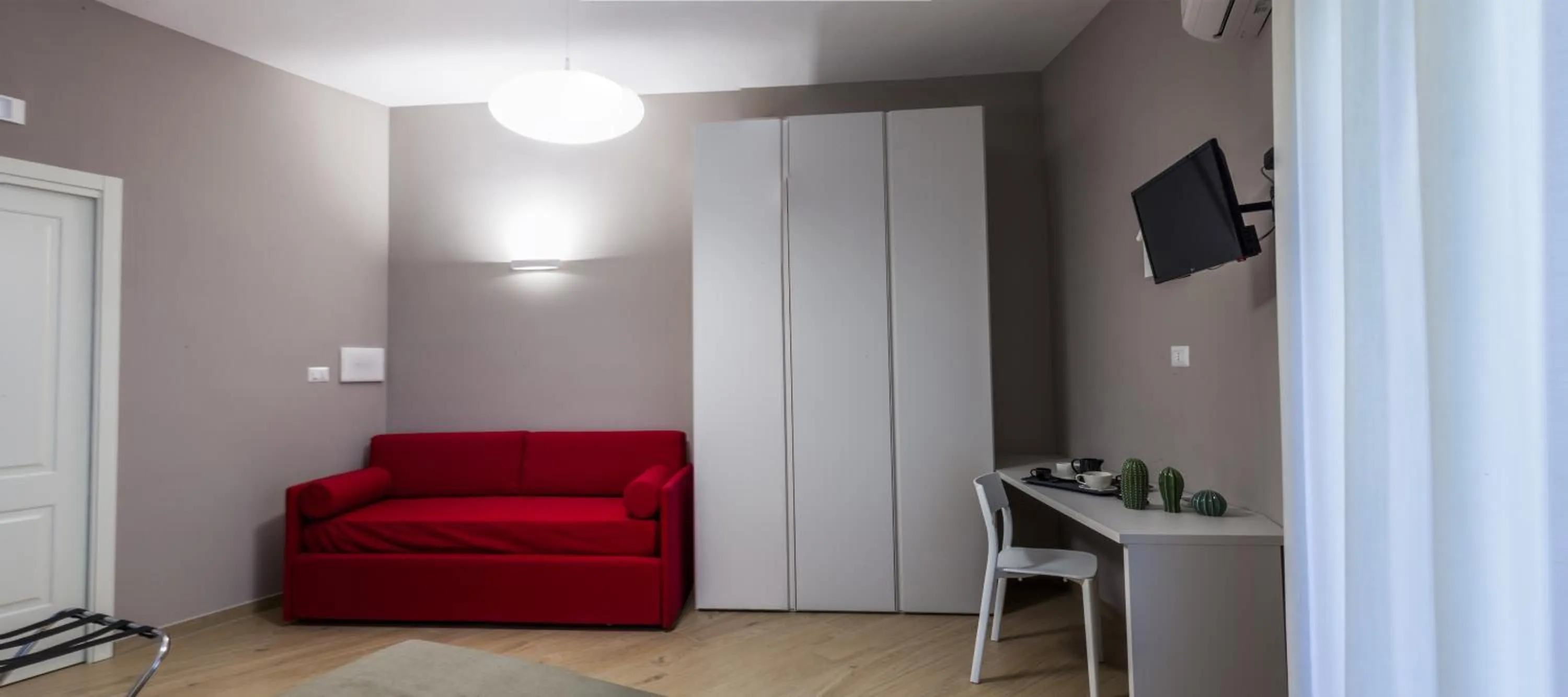 Living room in Euforia Napoli - Tre Sedi - Three Locations