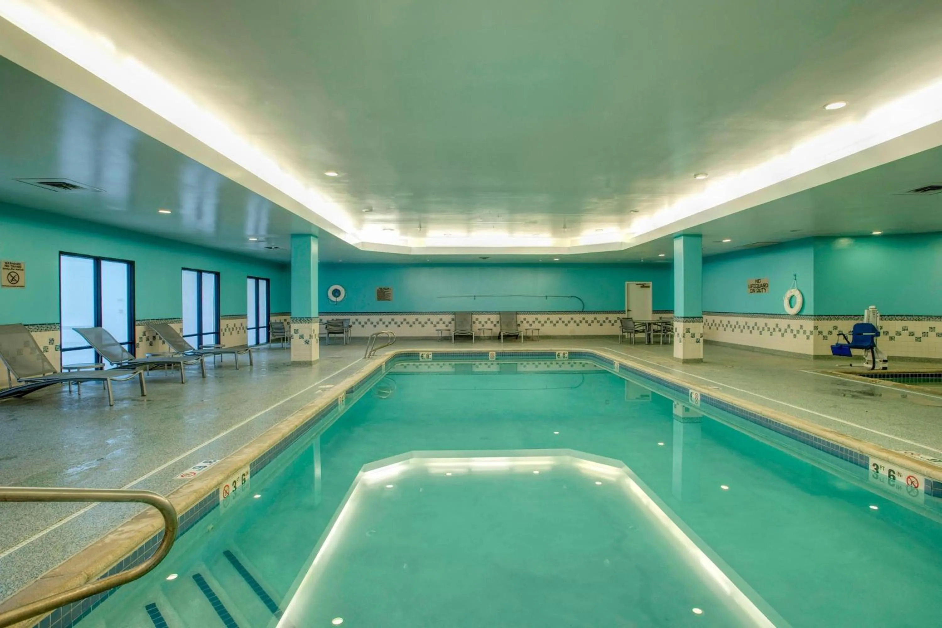 Swimming pool in SpringHill Suites by Marriott Lawrence Downtown