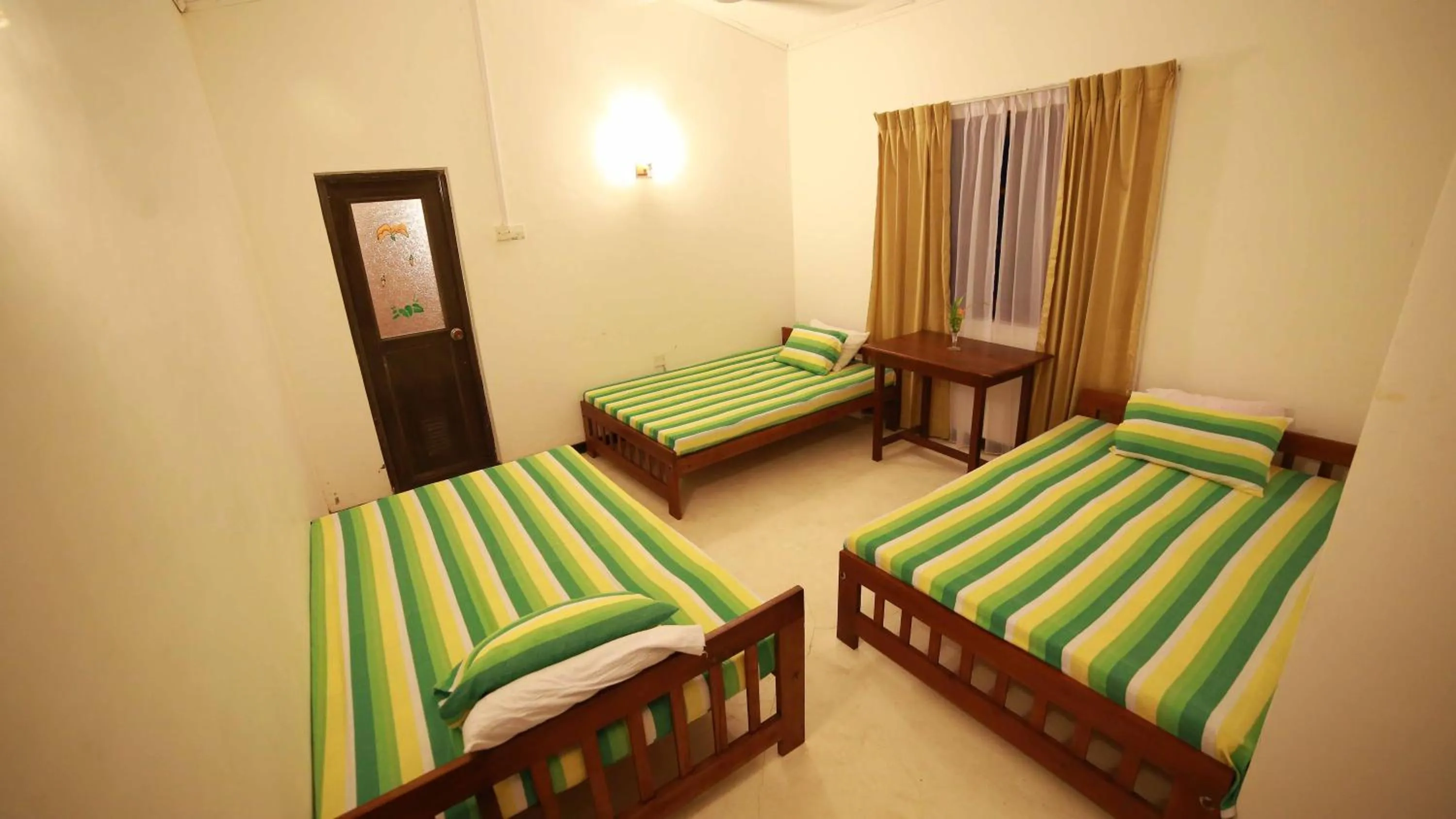 Photo of the whole room, Bed in Indi Rose Garden