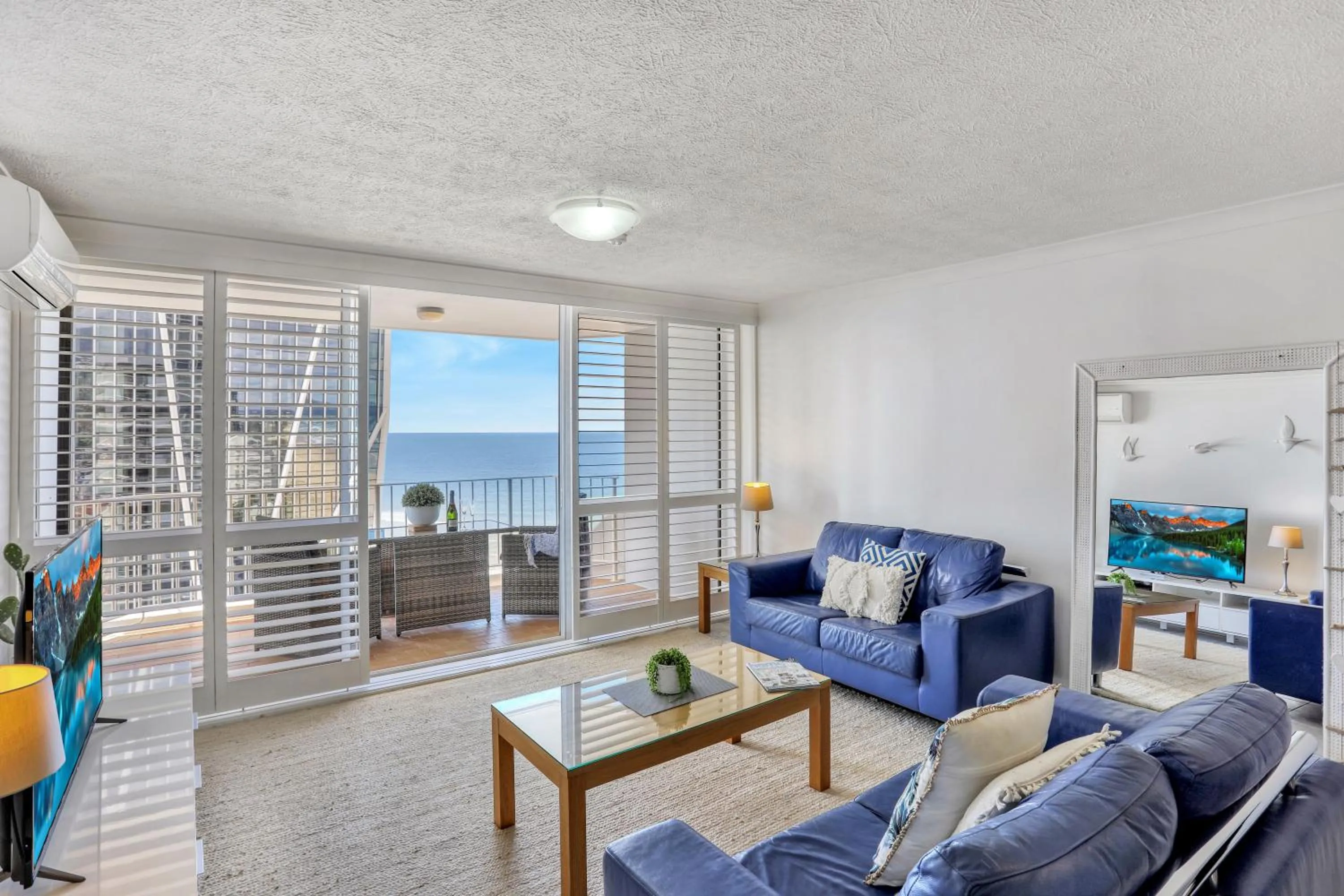 Living room in Breakers North Absolute Beachfront Apartments - Official
