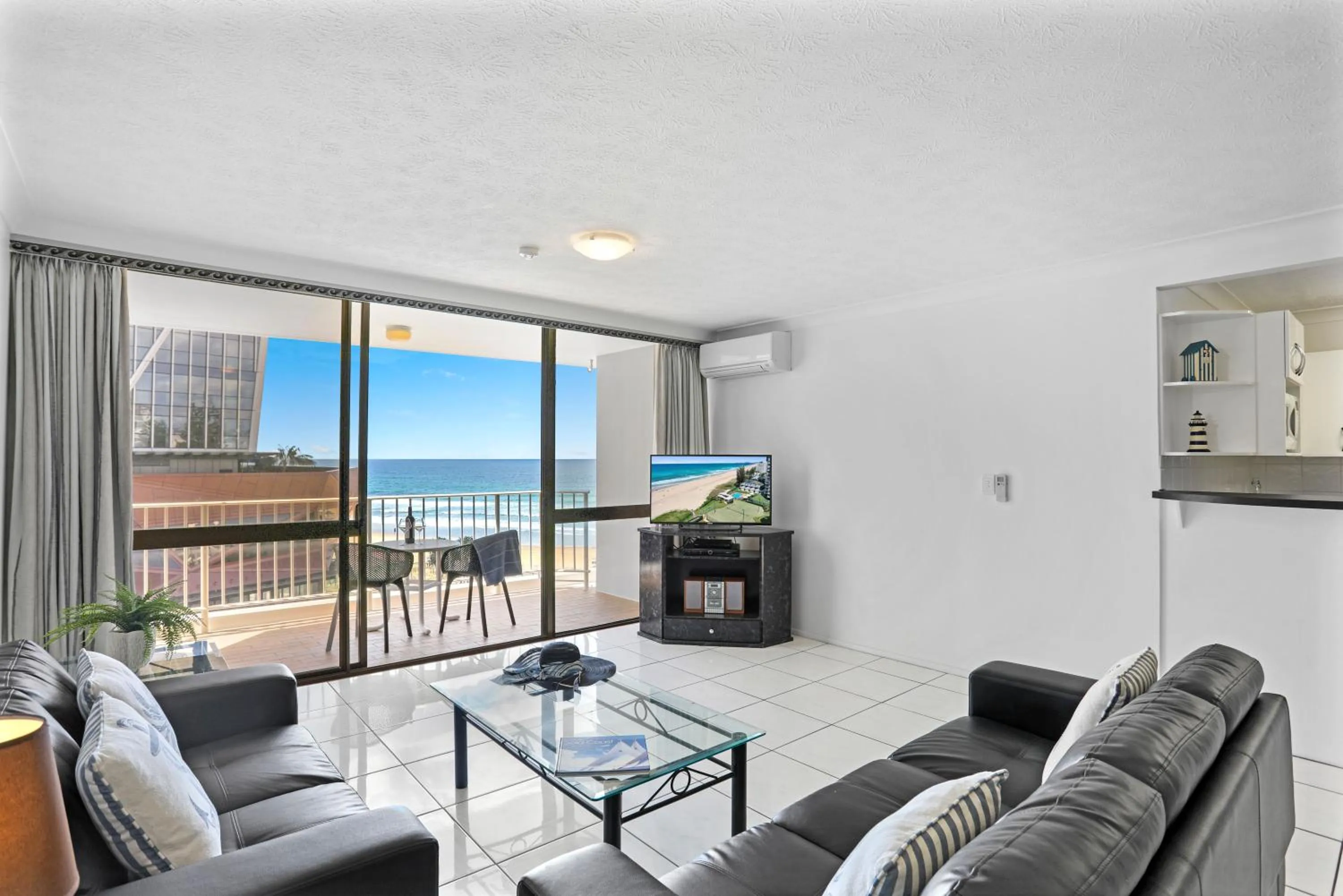 Living room in Breakers North Absolute Beachfront Apartments - Official