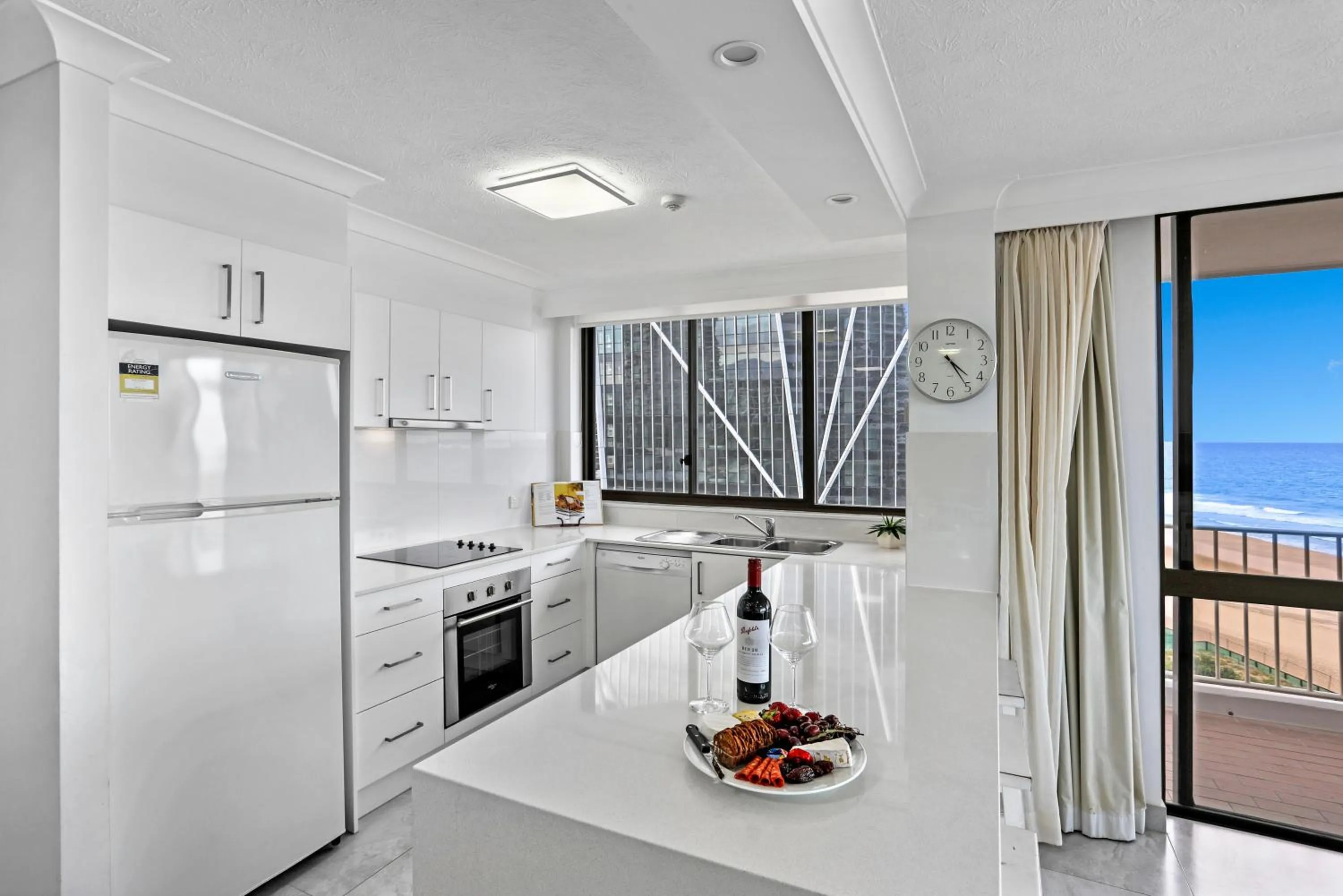 Kitchen or kitchenette in Breakers North Absolute Beachfront Apartments - Official