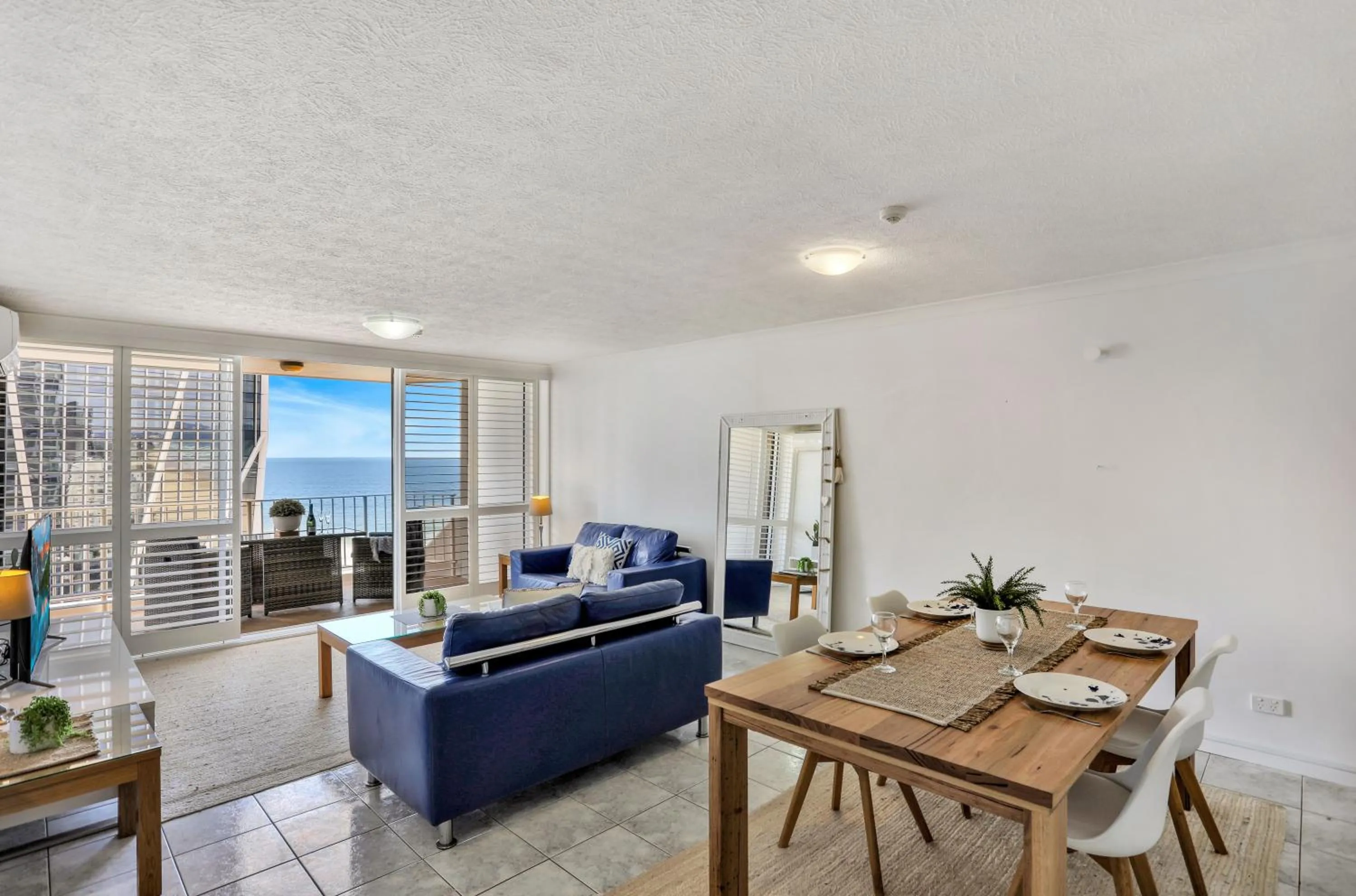 Living room in Breakers North Absolute Beachfront Apartments - Official