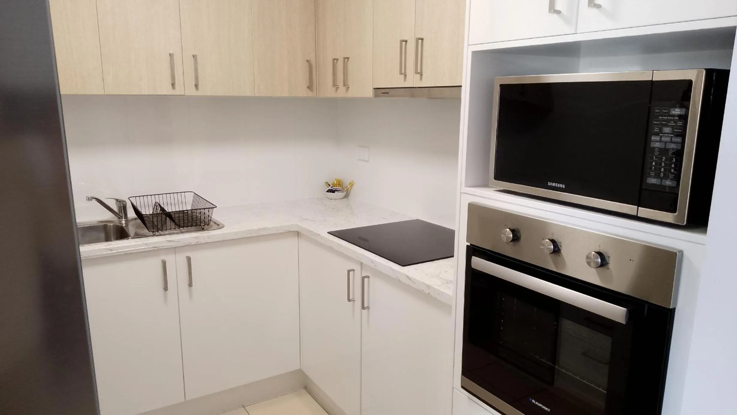 kitchen in Breakers North Absolute Beachfront Apartments - Official