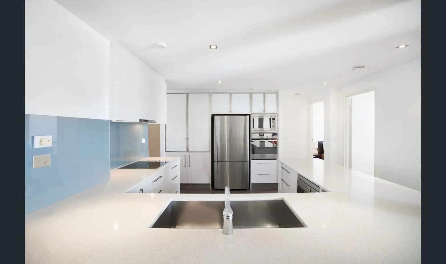 Kitchen or kitchenette in Breakers North Absolute Beachfront Apartments - Official