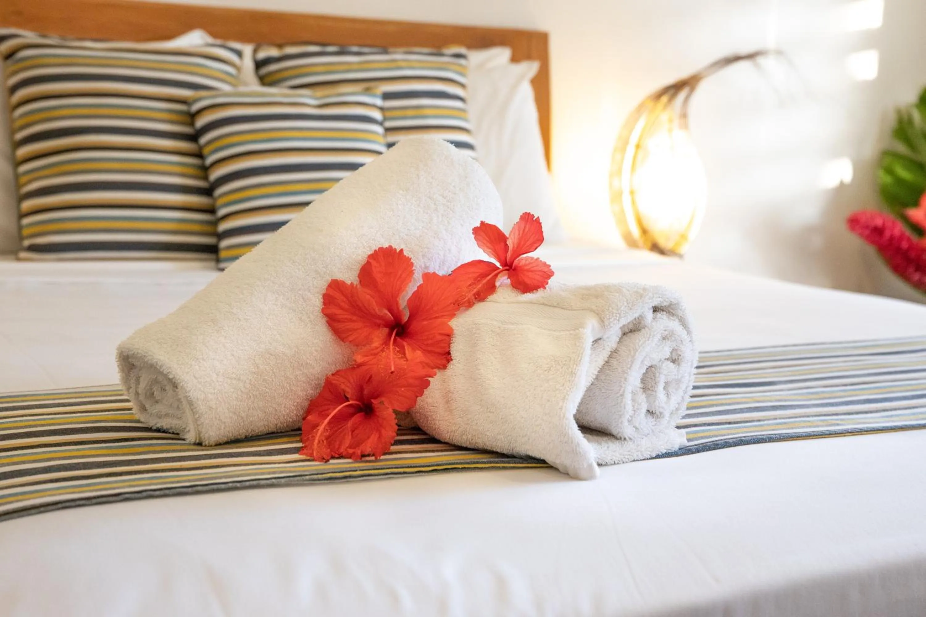 Bed in Tropicana Lagoon Apartments