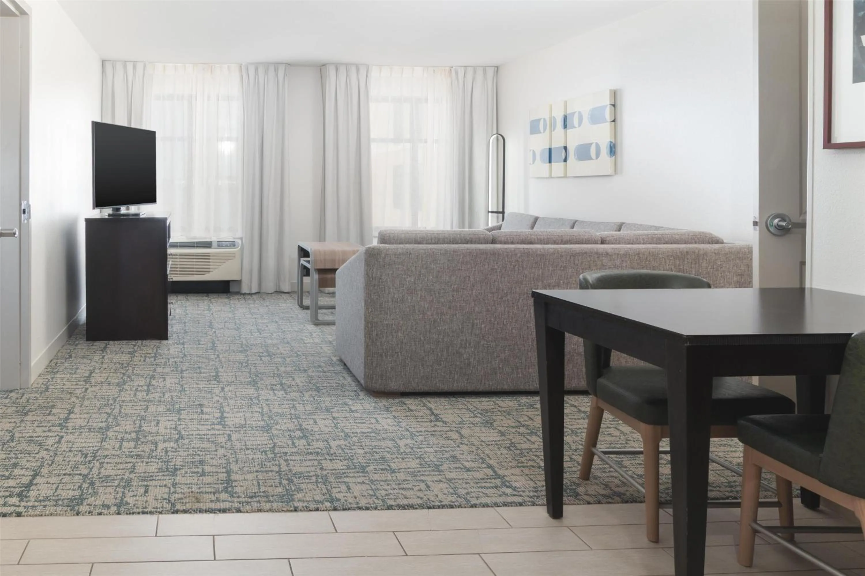 Living room, Bed in Homewood Suites By Hilton Wauwatosa Milwaukee