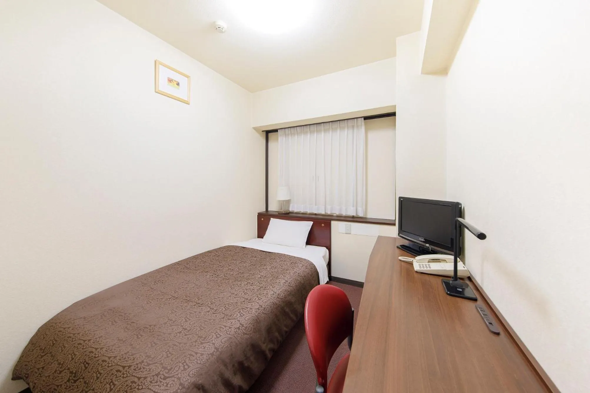 Bed in Dai-ni Sunny Stone Hotel