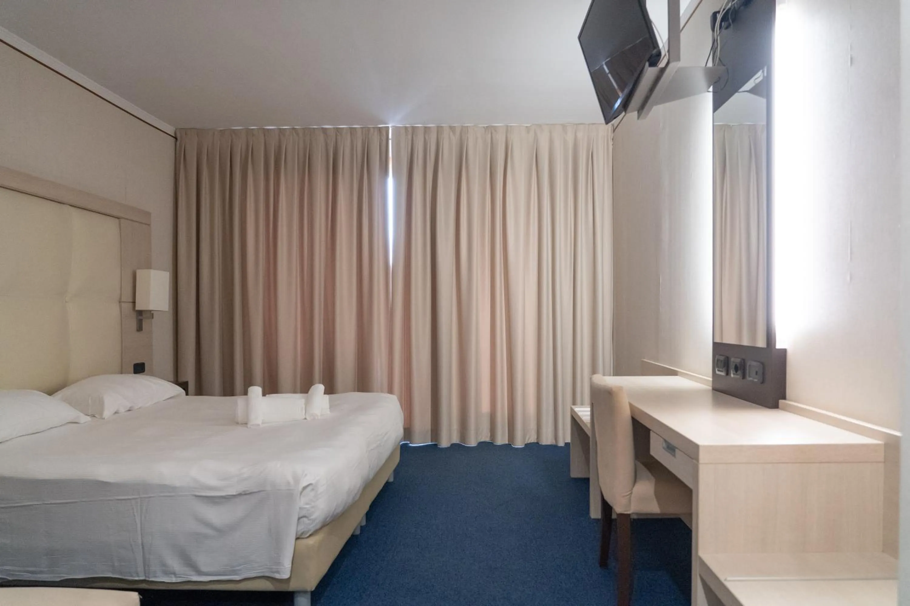 Bed in Cocca Hotel Royal Thai Spa