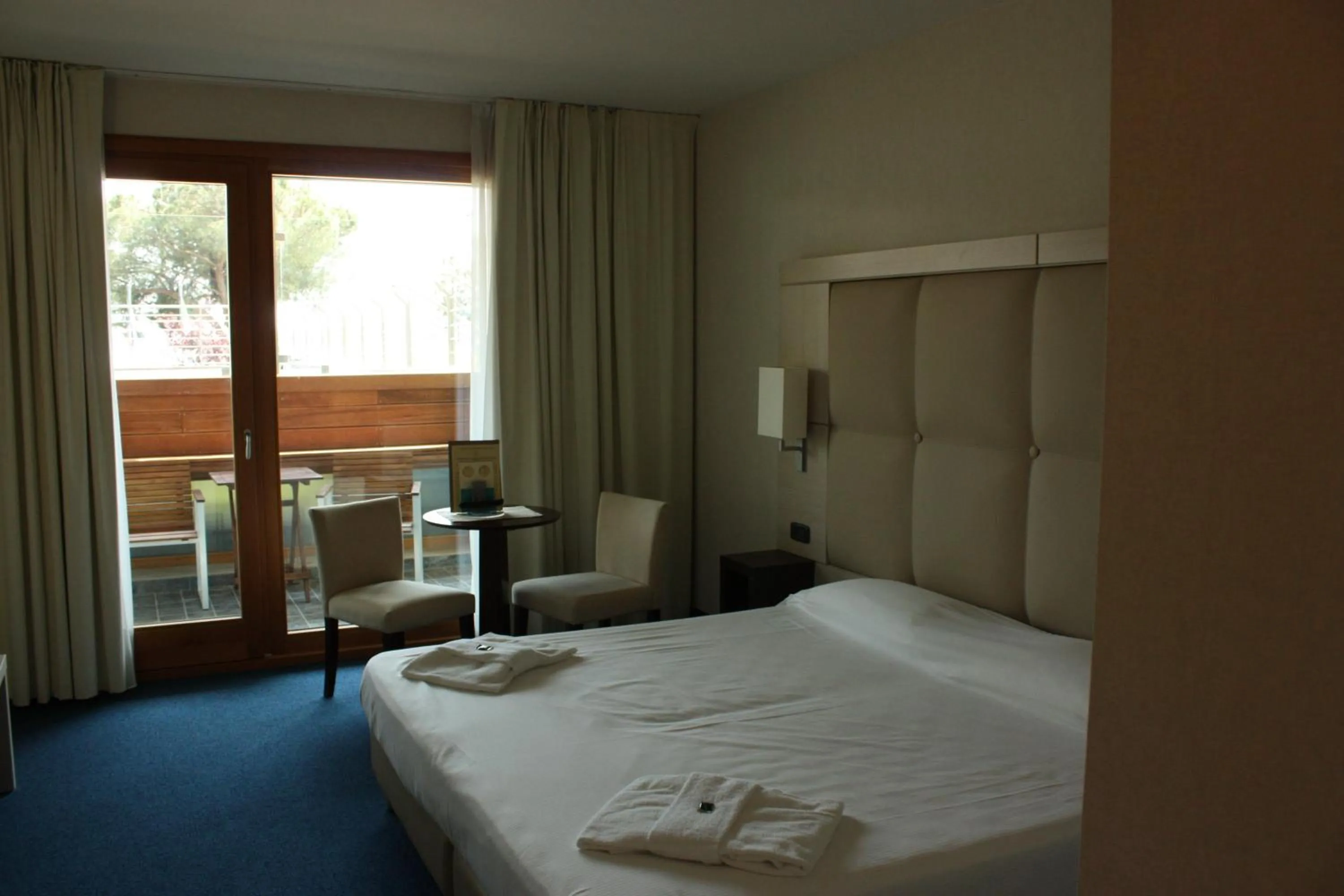 Bed in Cocca Hotel Royal Thai Spa