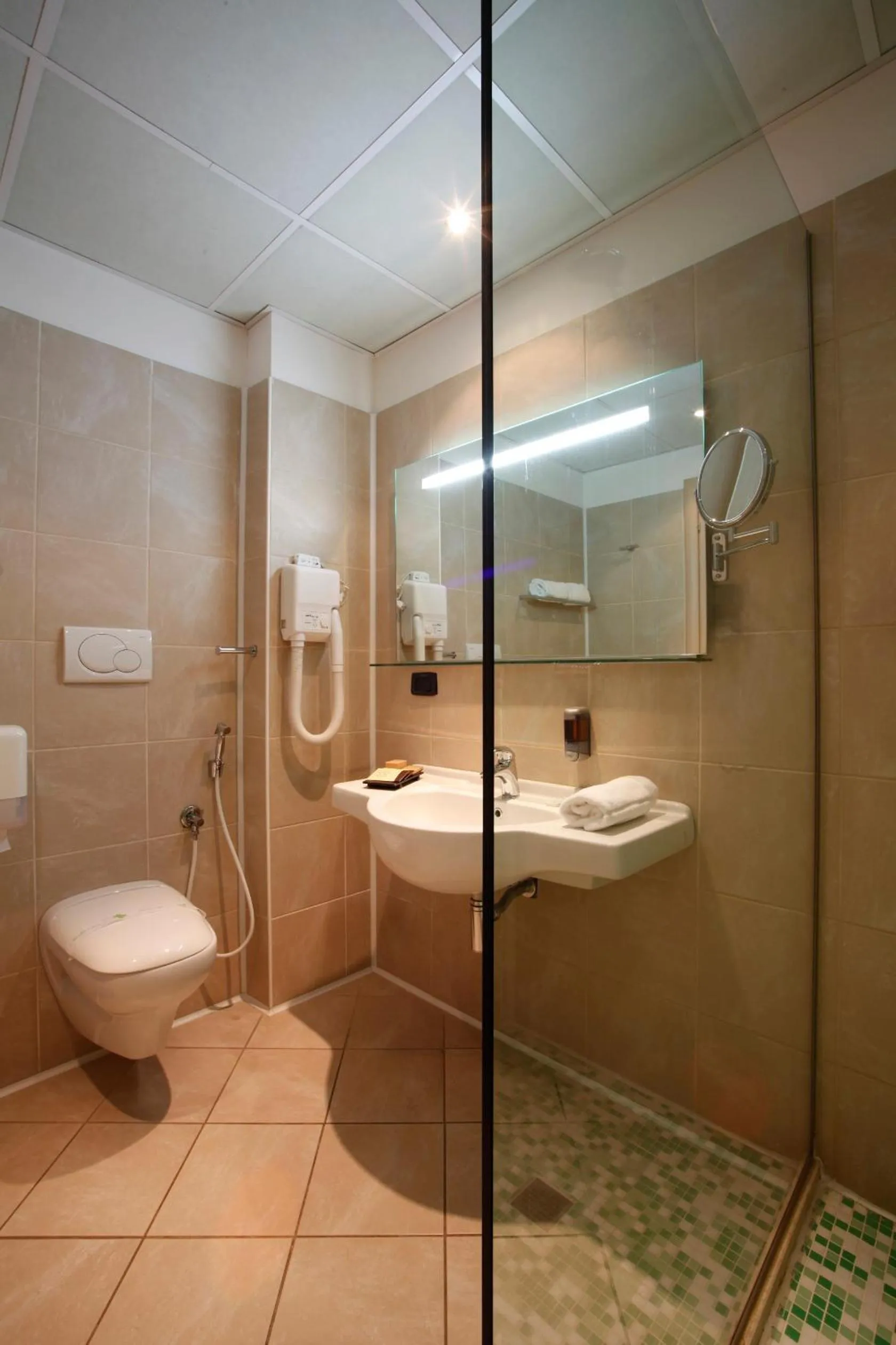 Bathroom in Cocca Hotel Royal Thai Spa