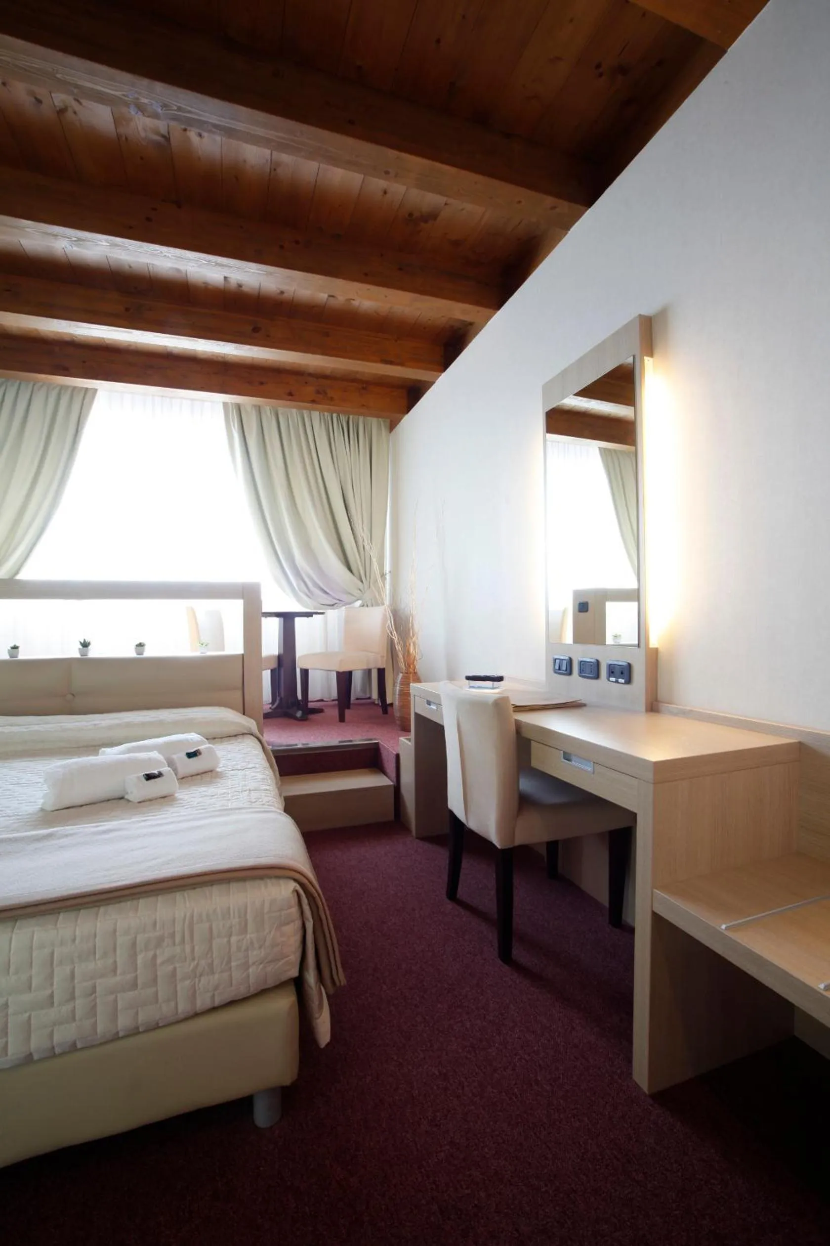 Bed in Cocca Hotel Royal Thai Spa