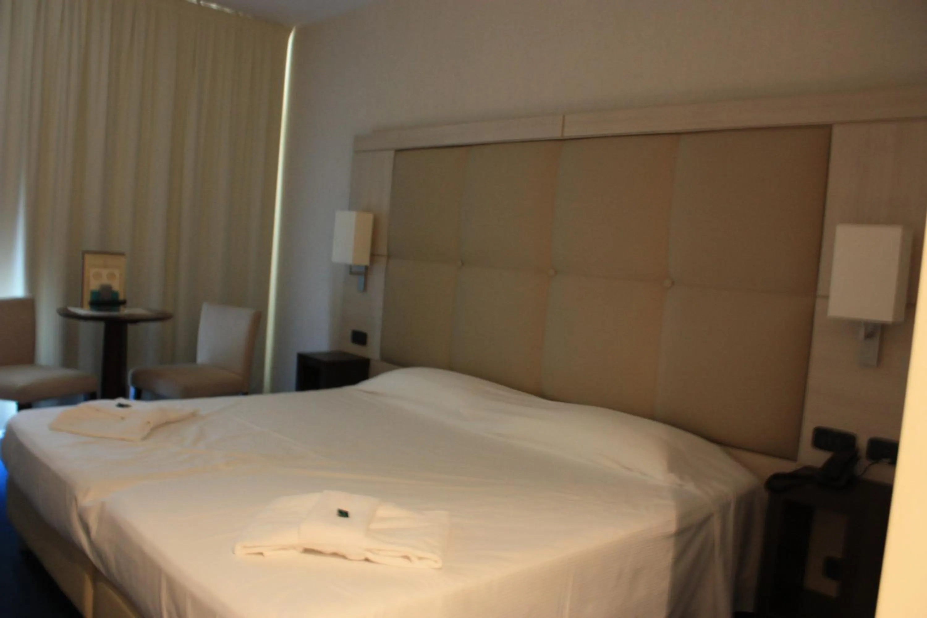 Bed in Cocca Hotel Royal Thai Spa