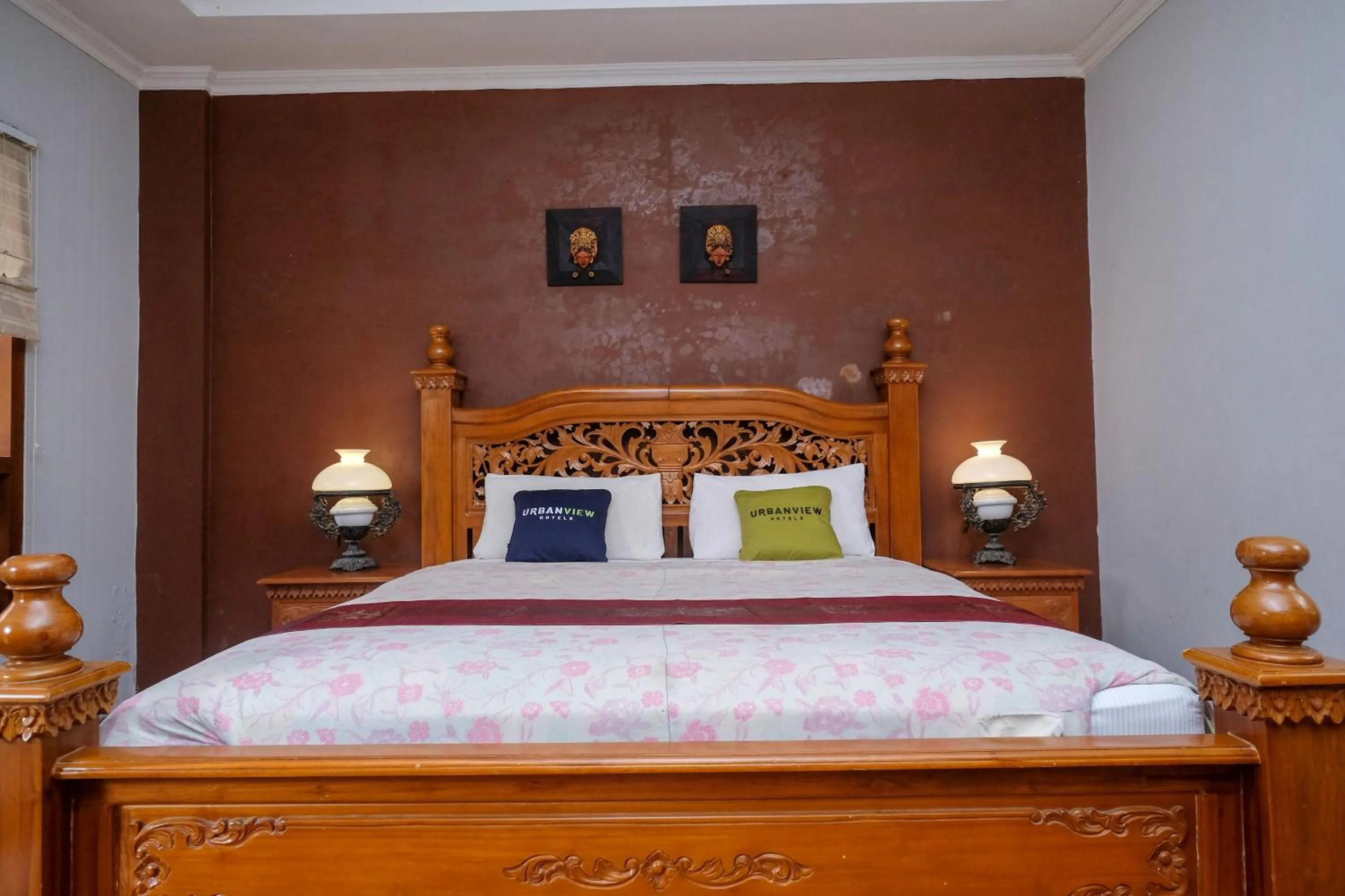 Bedroom, Bed in Urbanview Omah Eka Santi by RedDoorz