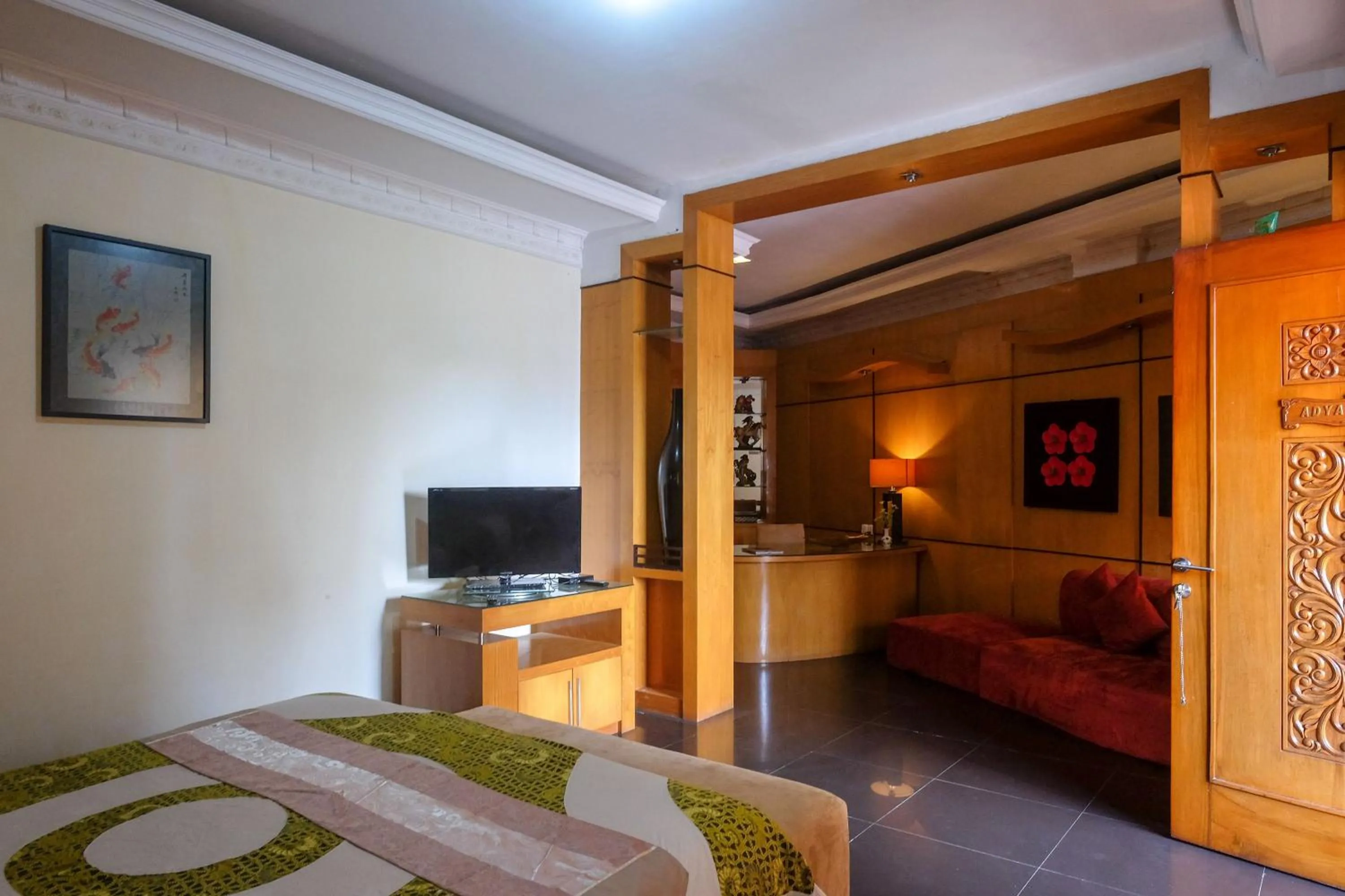 Bedroom, Bed in Urbanview Omah Eka Santi by RedDoorz