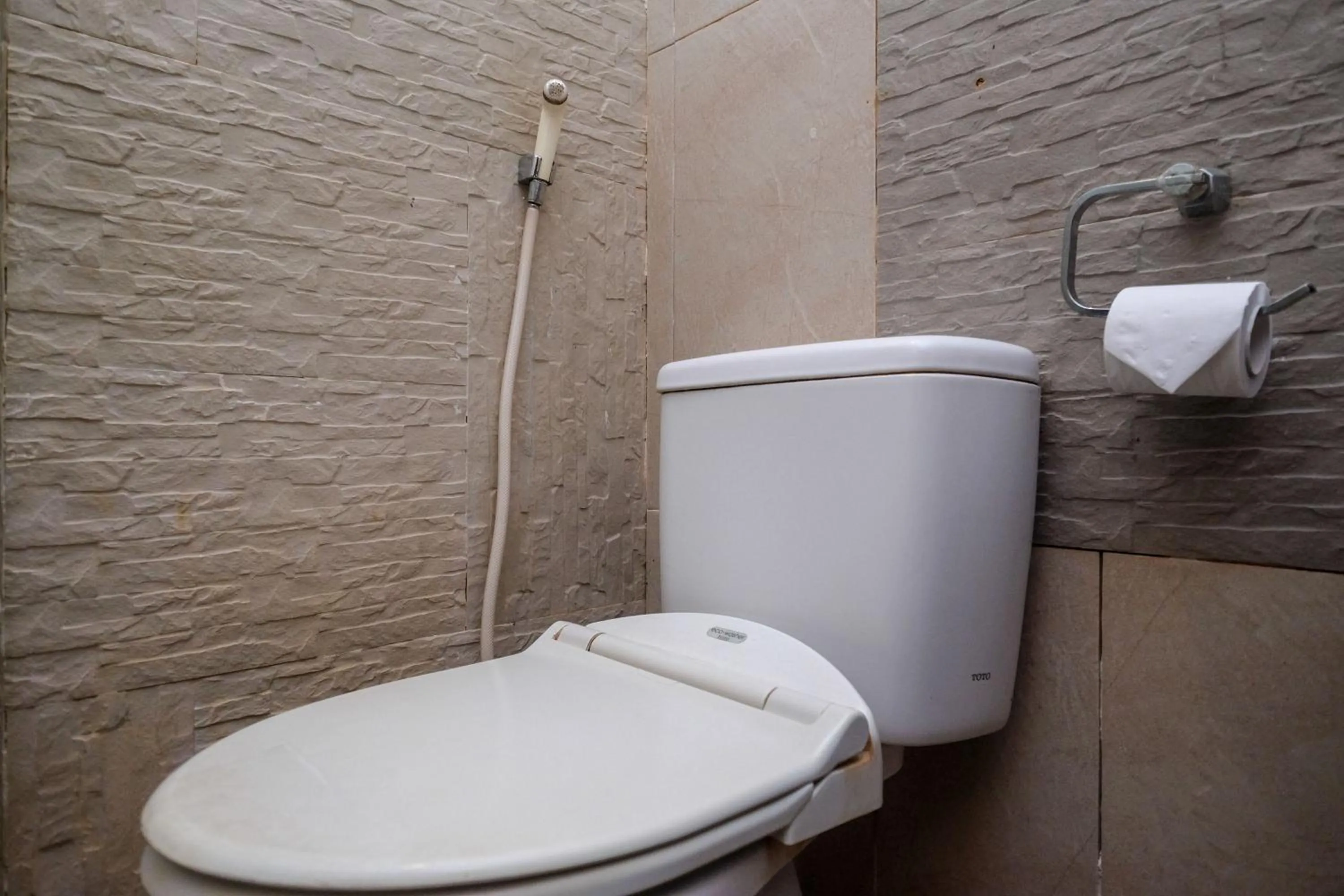 Bathroom in Urbanview Omah Eka Santi by RedDoorz