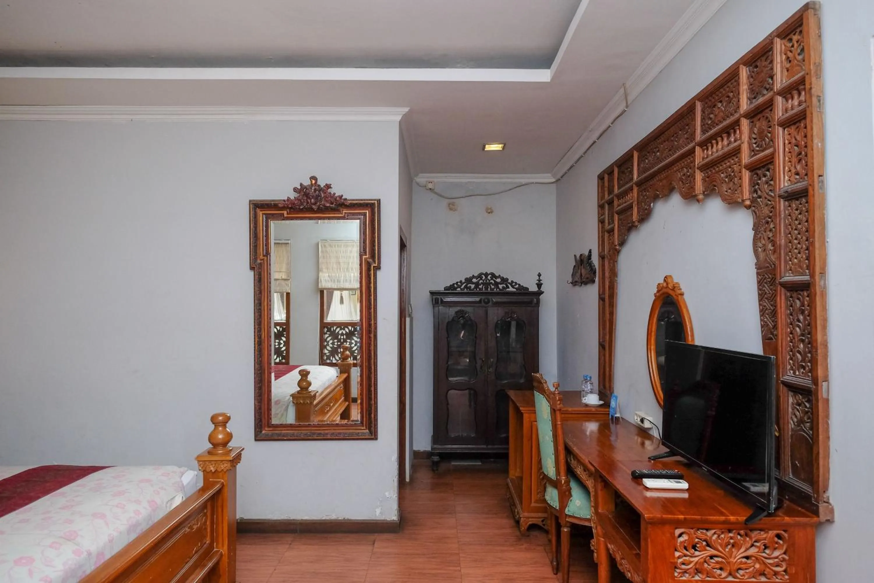 Bedroom, Bed in Urbanview Omah Eka Santi by RedDoorz