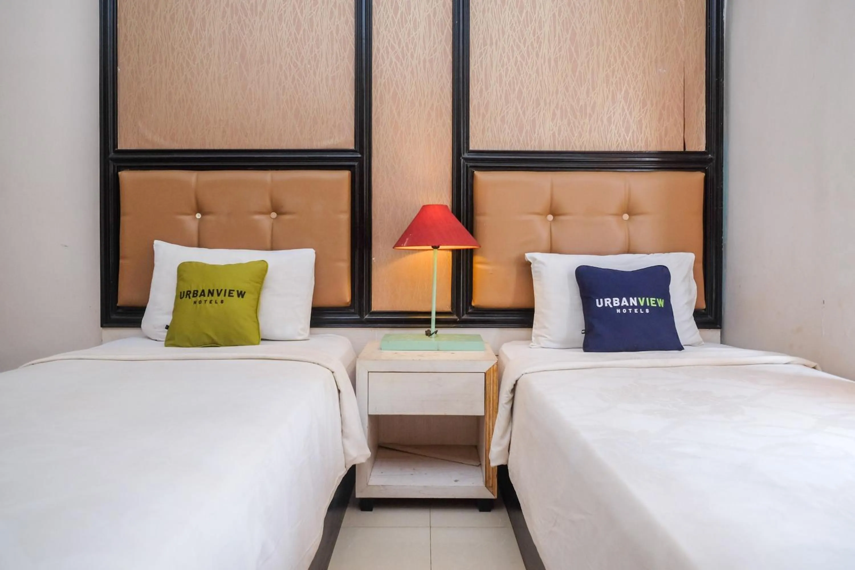 Bedroom, Bed in Urbanview Omah Eka Santi by RedDoorz