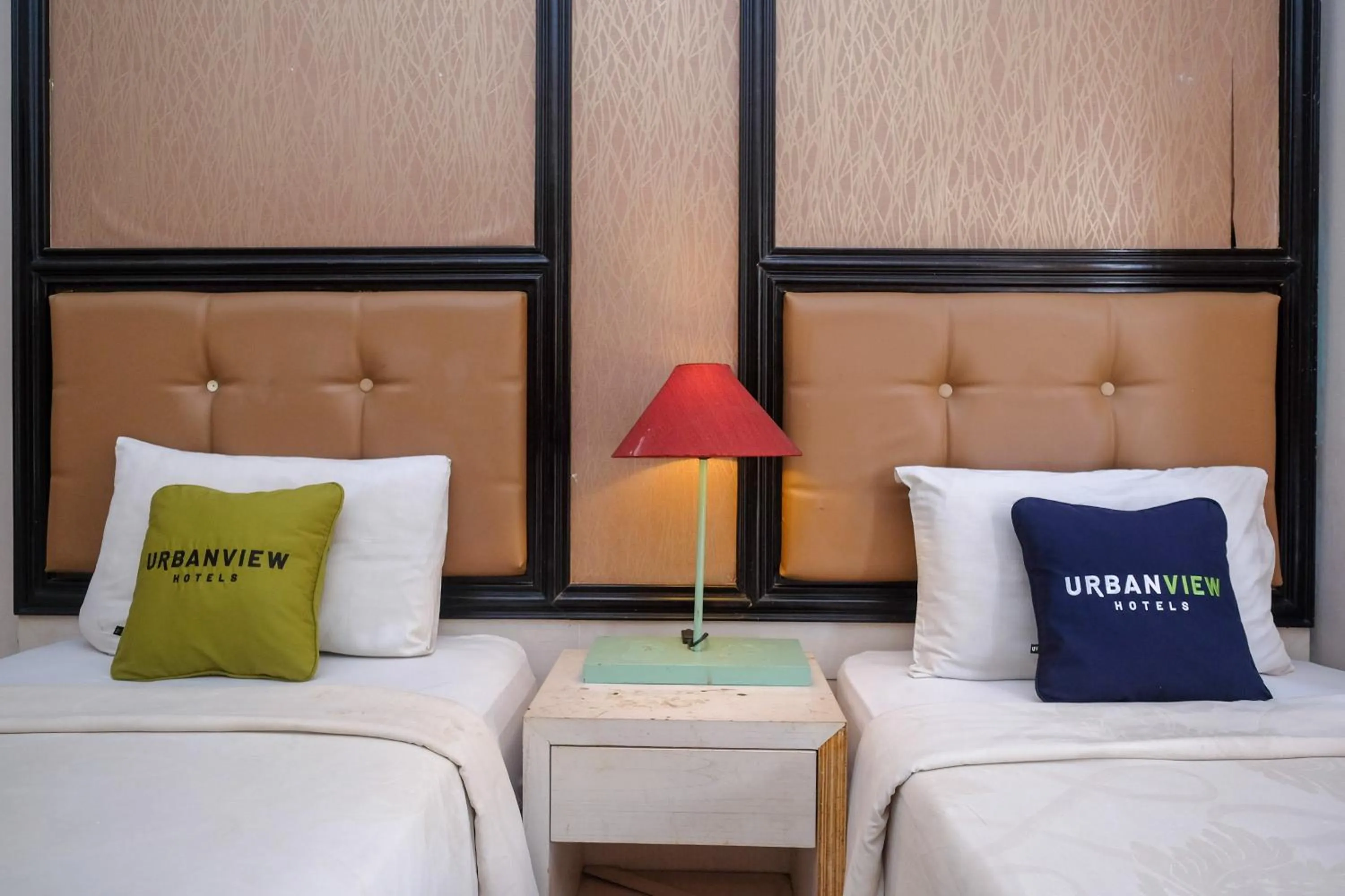 Bedroom, Bed in Urbanview Omah Eka Santi by RedDoorz