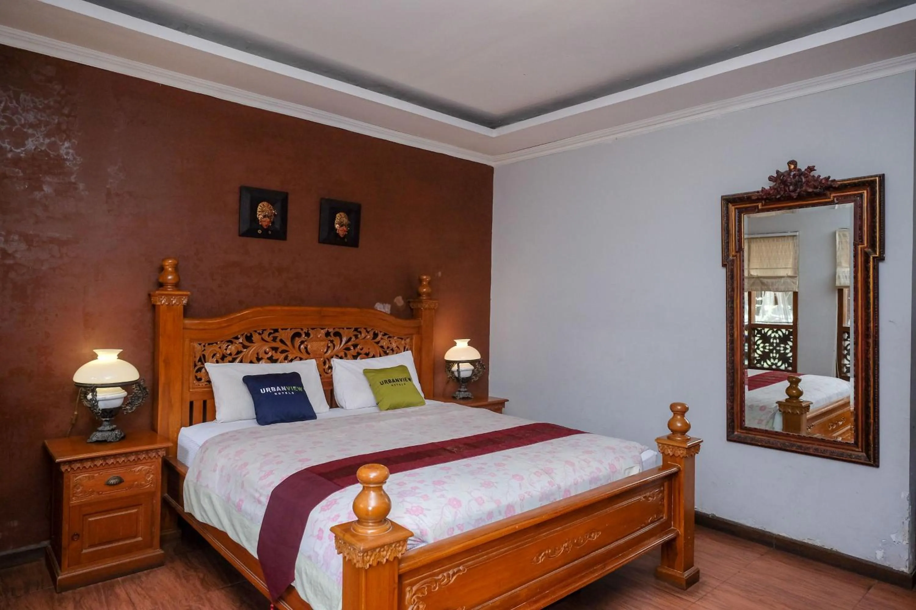 Bedroom, Bed in Urbanview Omah Eka Santi by RedDoorz