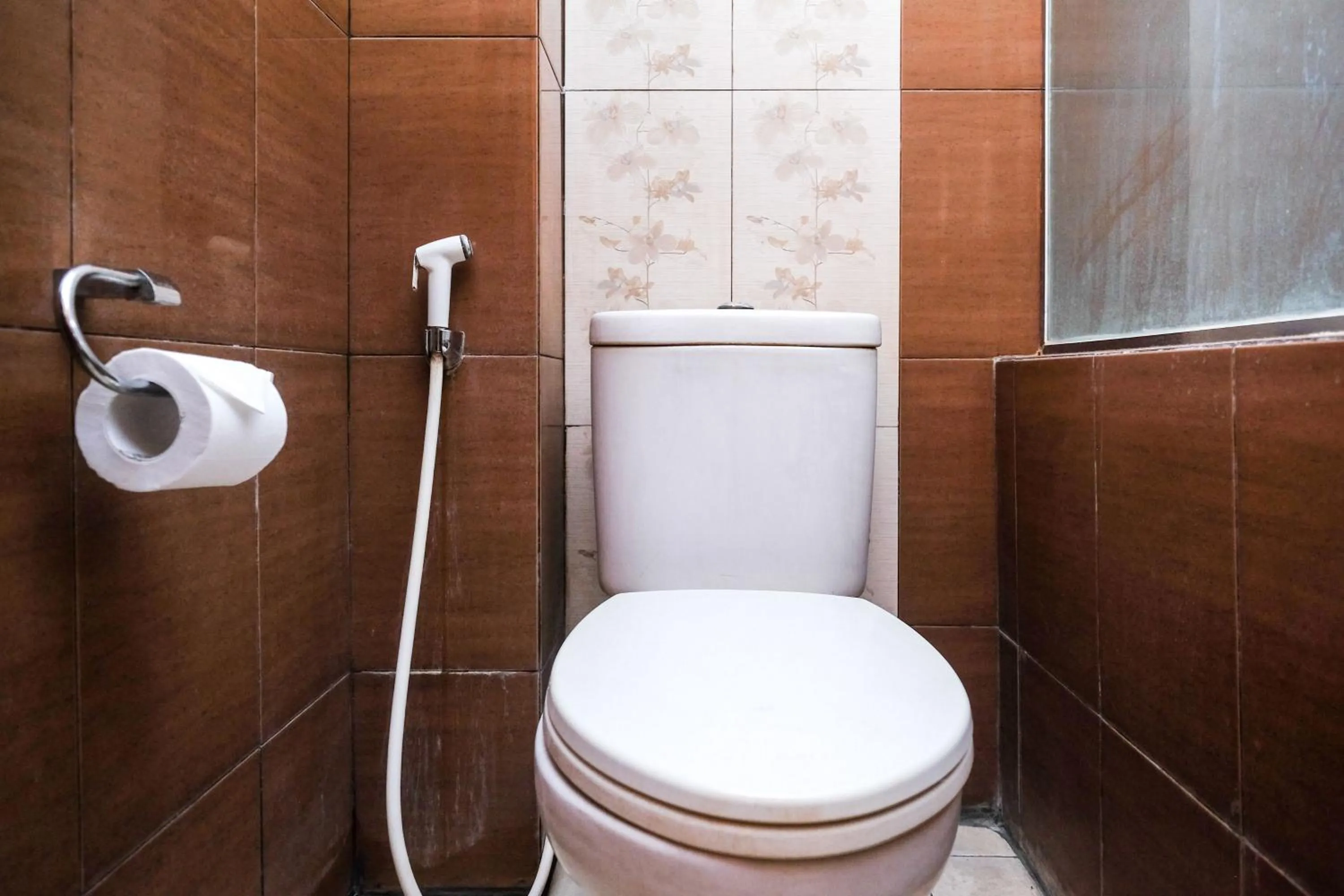 Bathroom in Urbanview Omah Eka Santi by RedDoorz