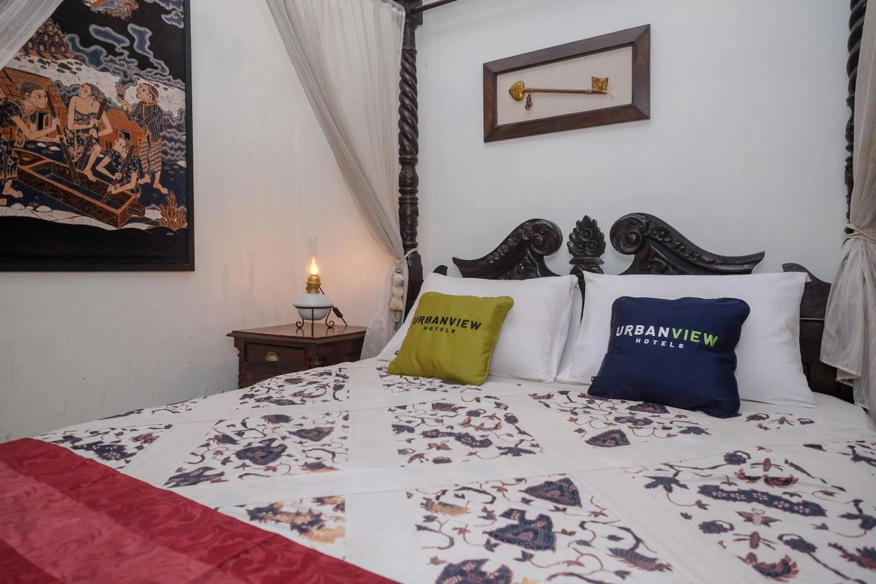 Bedroom, Bed in Urbanview Omah Eka Santi by RedDoorz