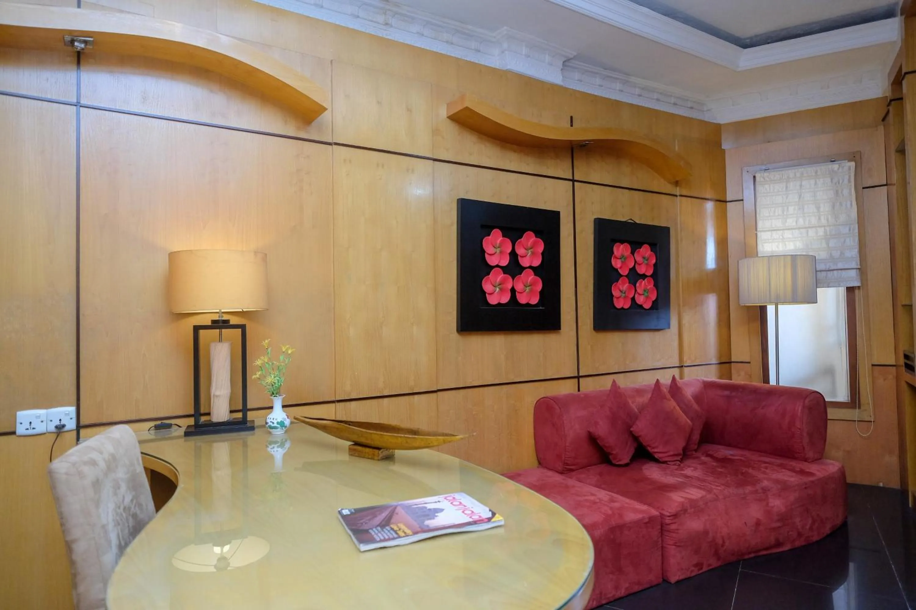 Seating area in Urbanview Omah Eka Santi by RedDoorz