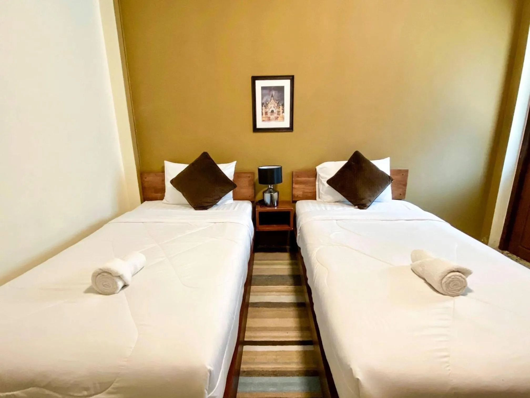 Bed in Baan Dan Ta Wan Nuea