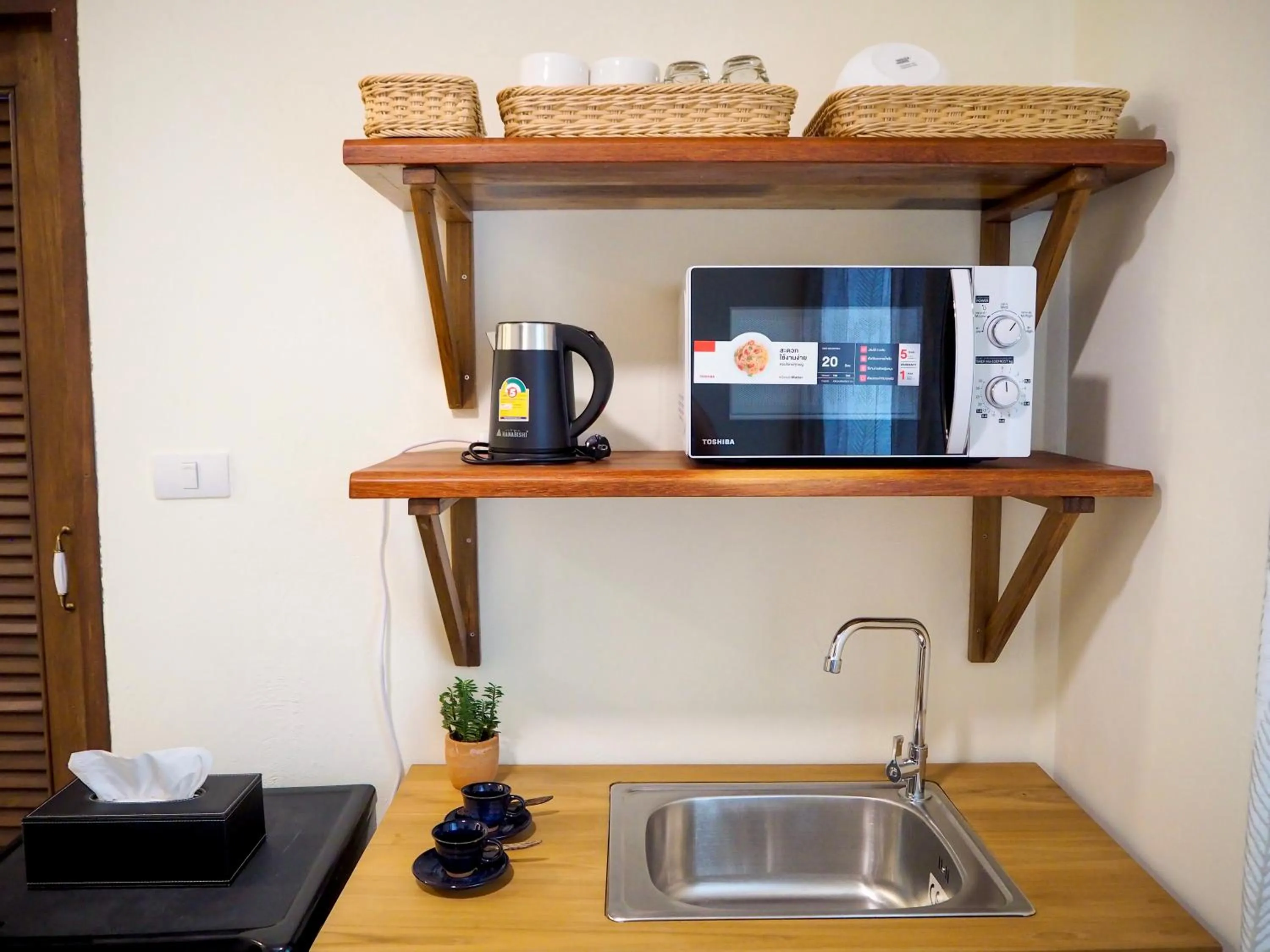 Kitchen or kitchenette in Baan Dan Ta Wan Nuea