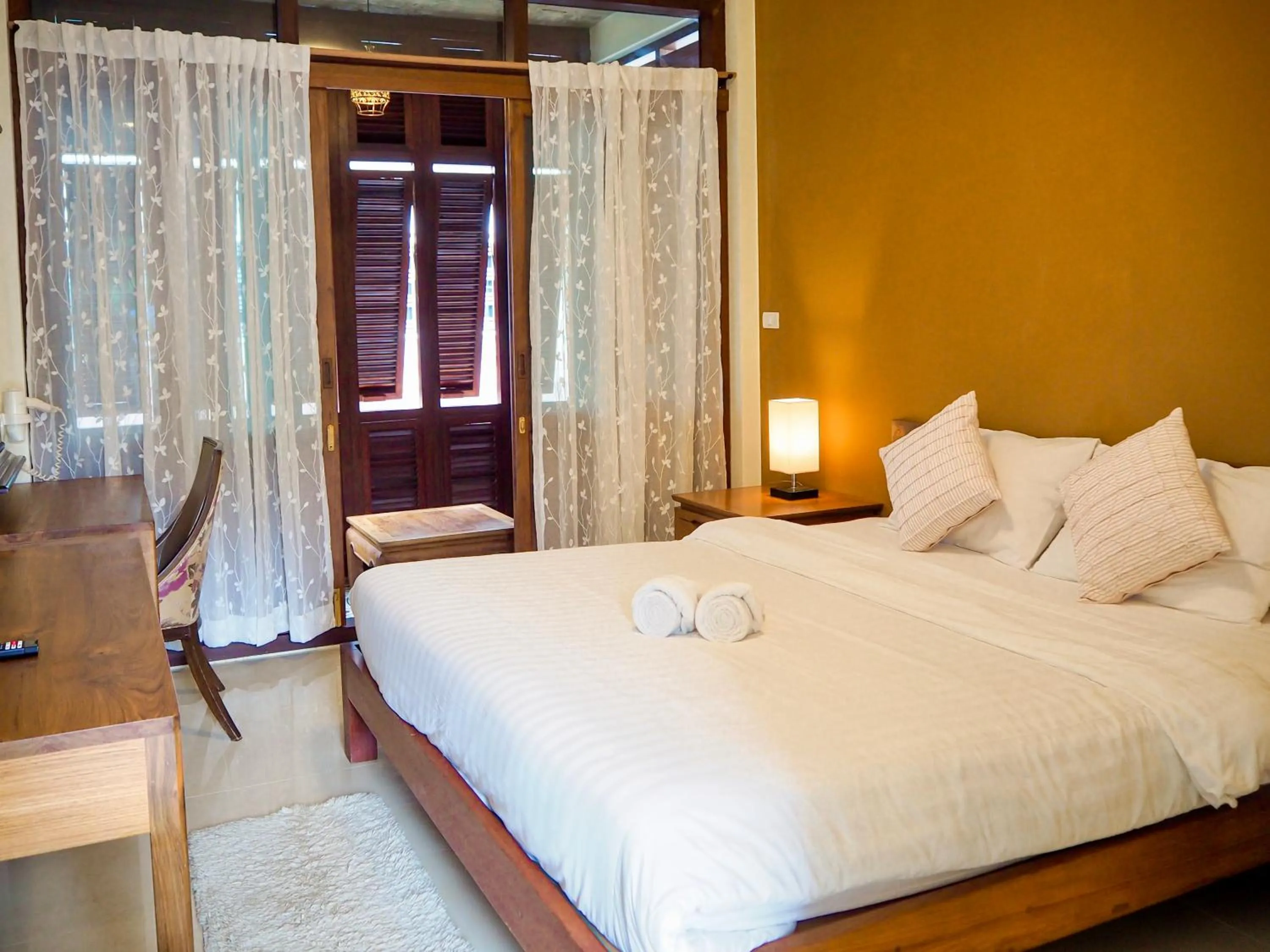 Bed in Baan Dan Ta Wan Nuea