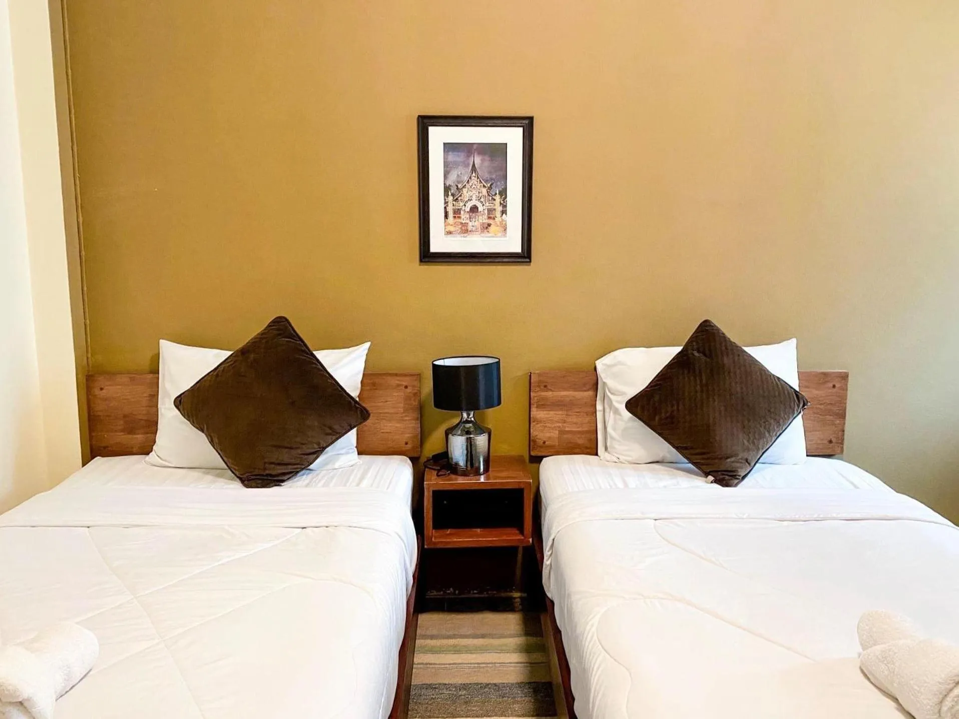 Bed in Baan Dan Ta Wan Nuea