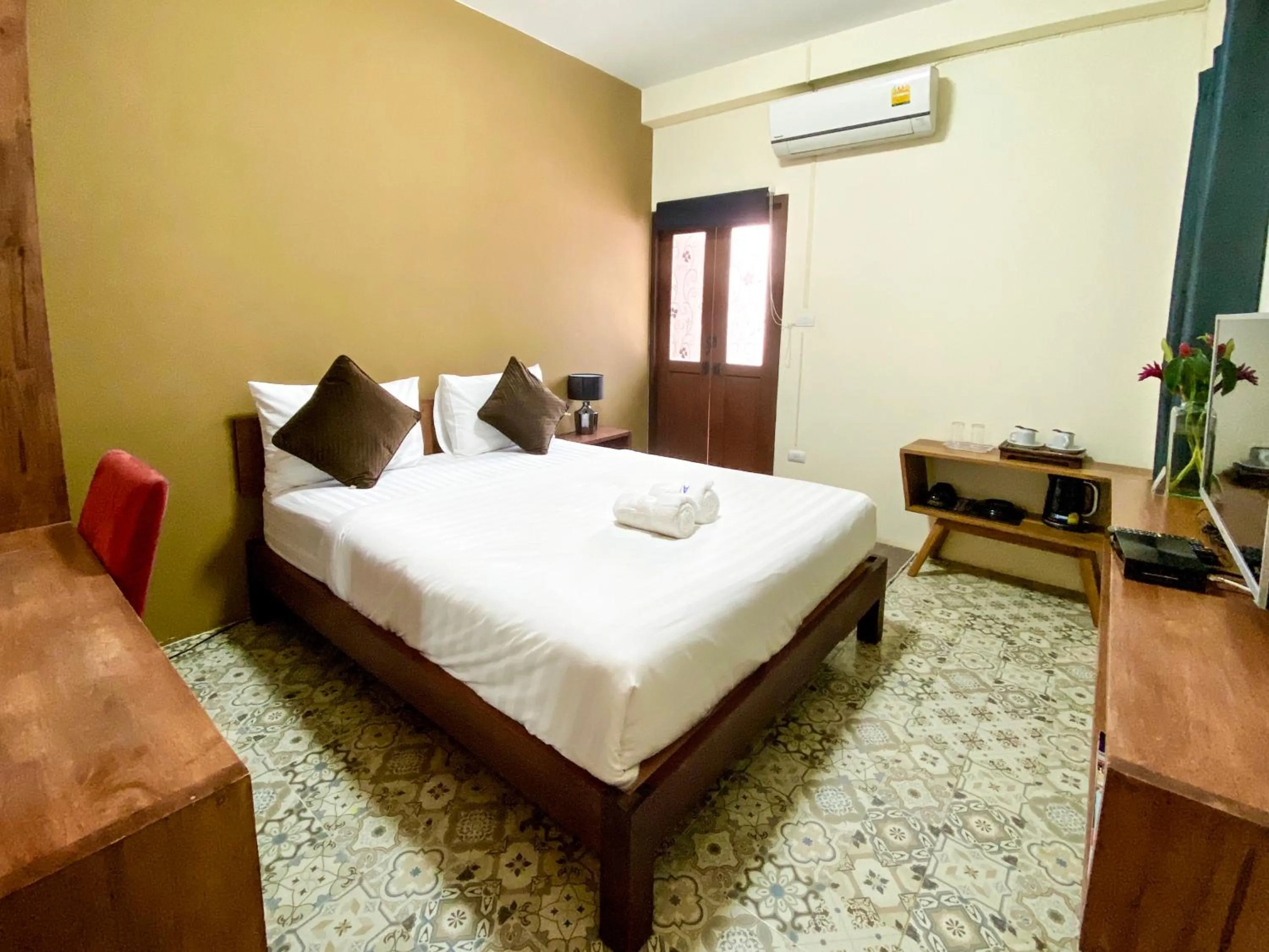 Bed in Baan Dan Ta Wan Nuea