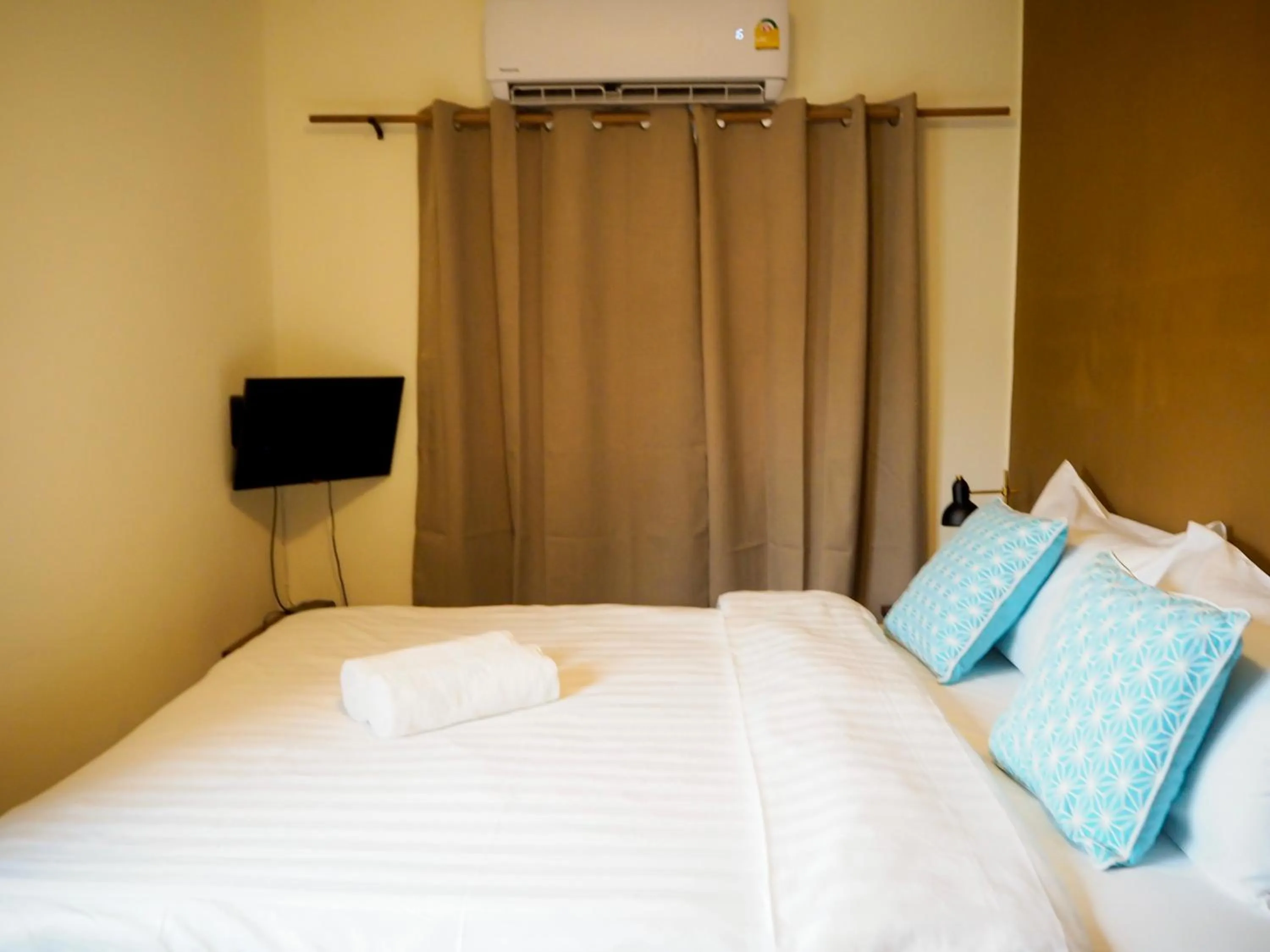 Bed in Baan Dan Ta Wan Nuea