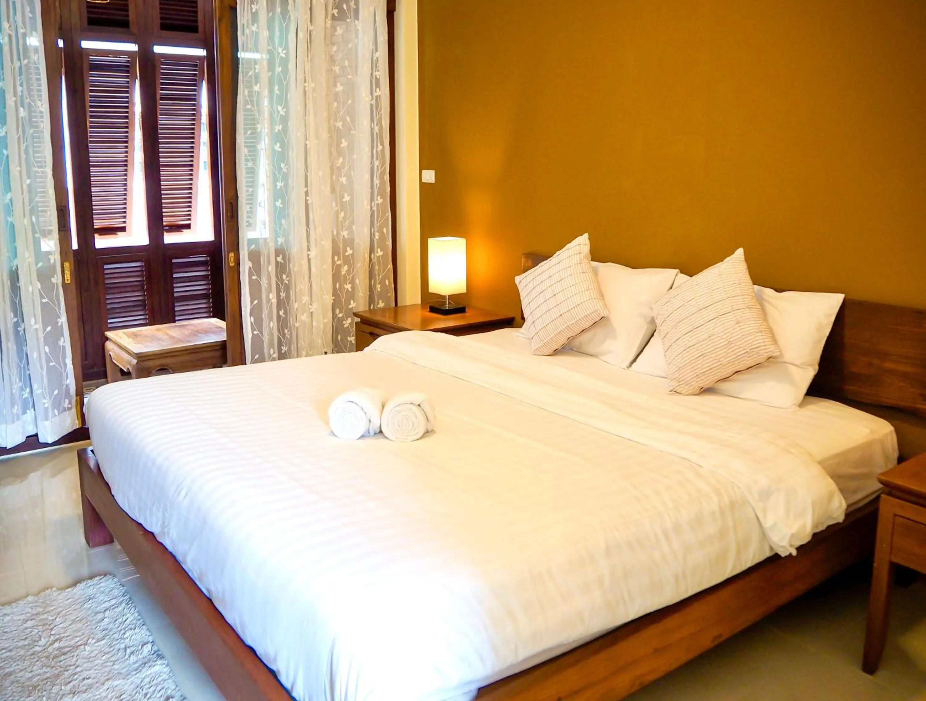 Bed in Baan Dan Ta Wan Nuea