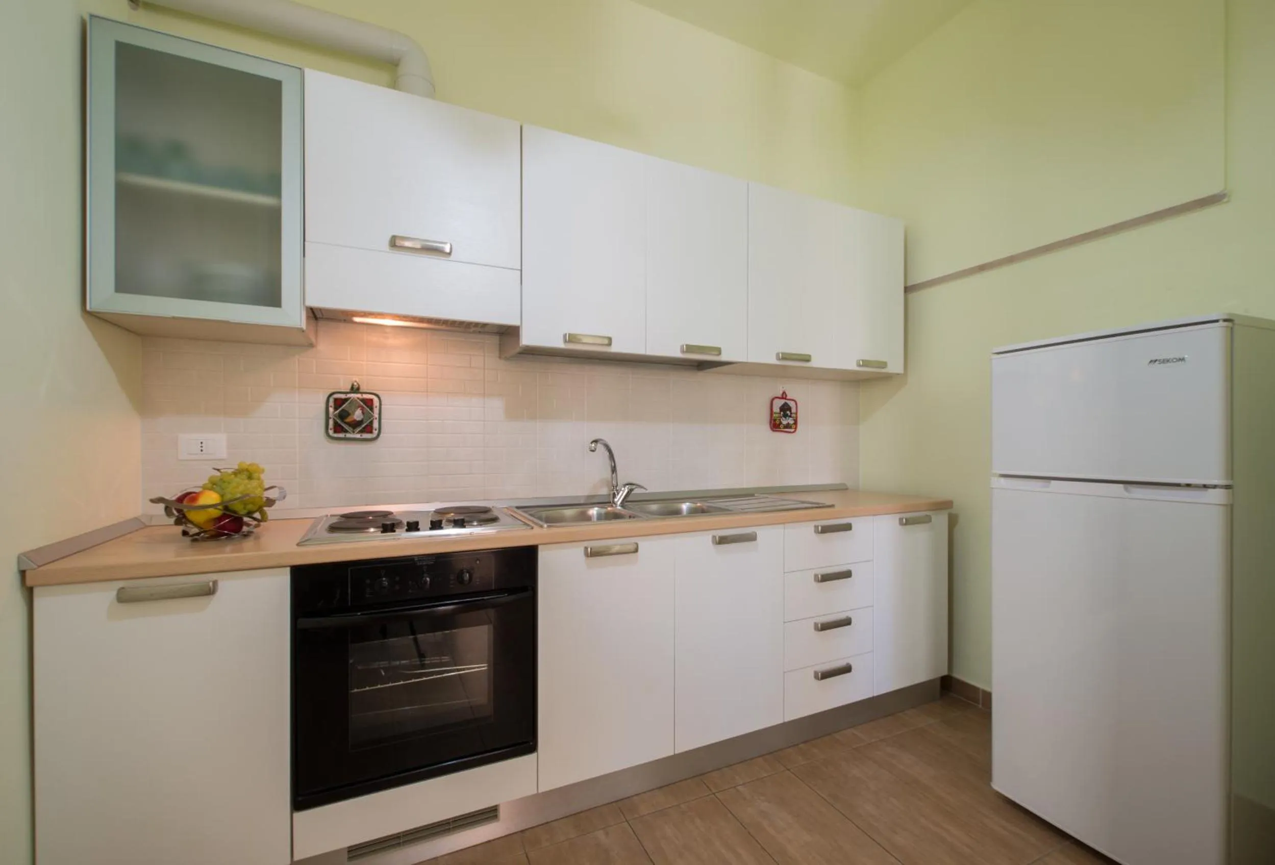 Kitchen or kitchenette in Residence Palazzo Gasparroni