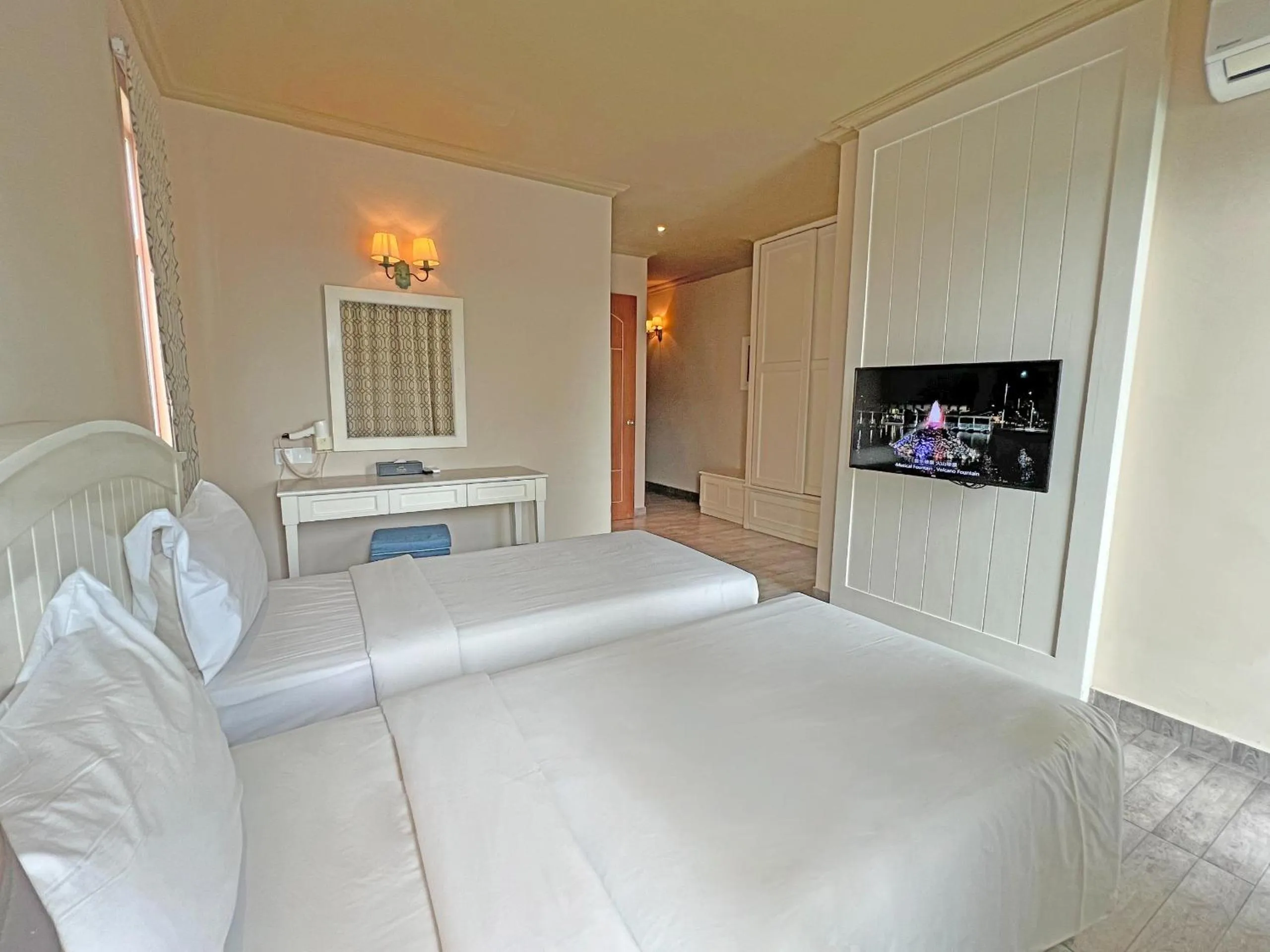 Bed in Tasik Villa International Resort