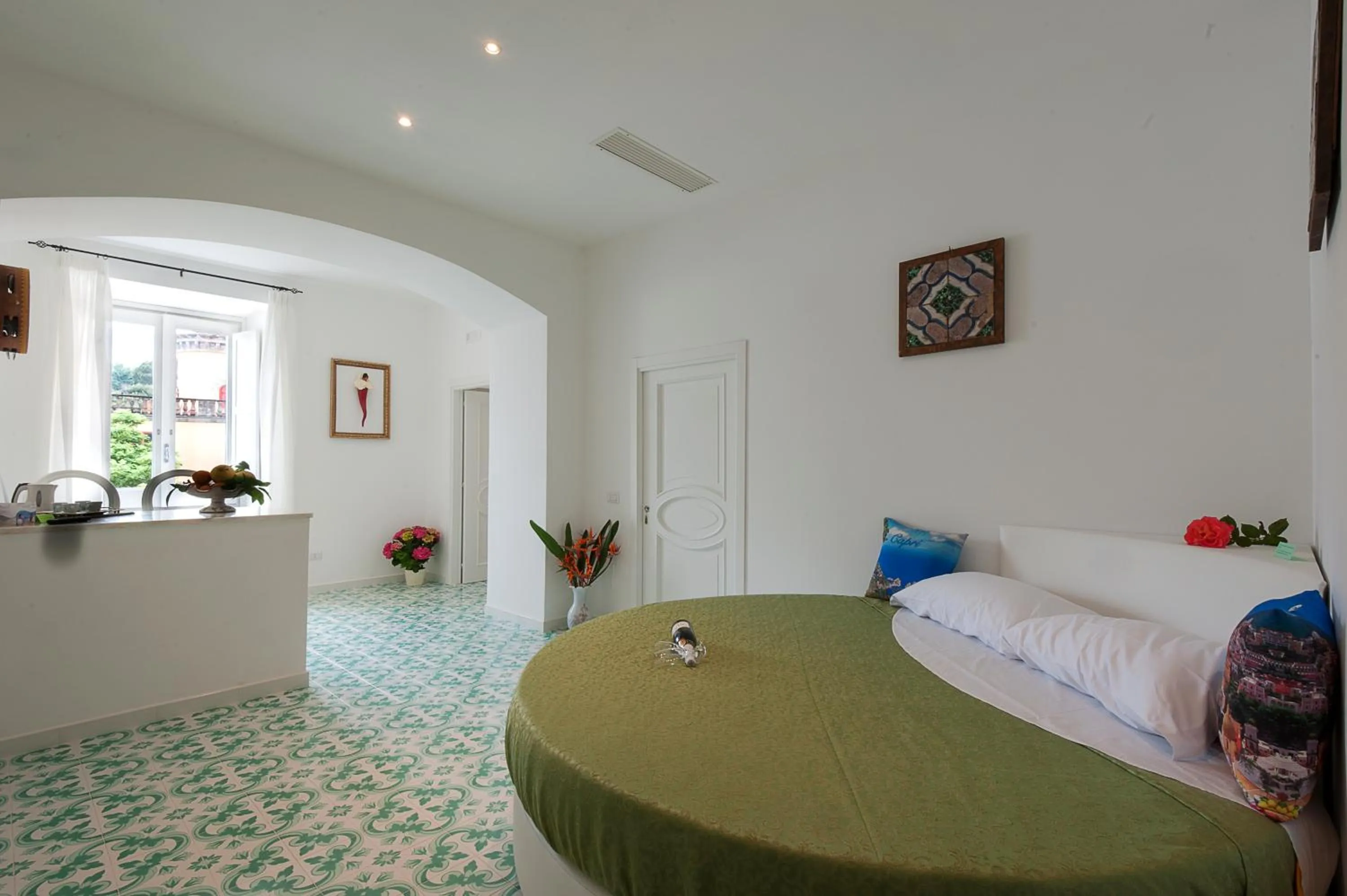 Bed in Surriento Suites