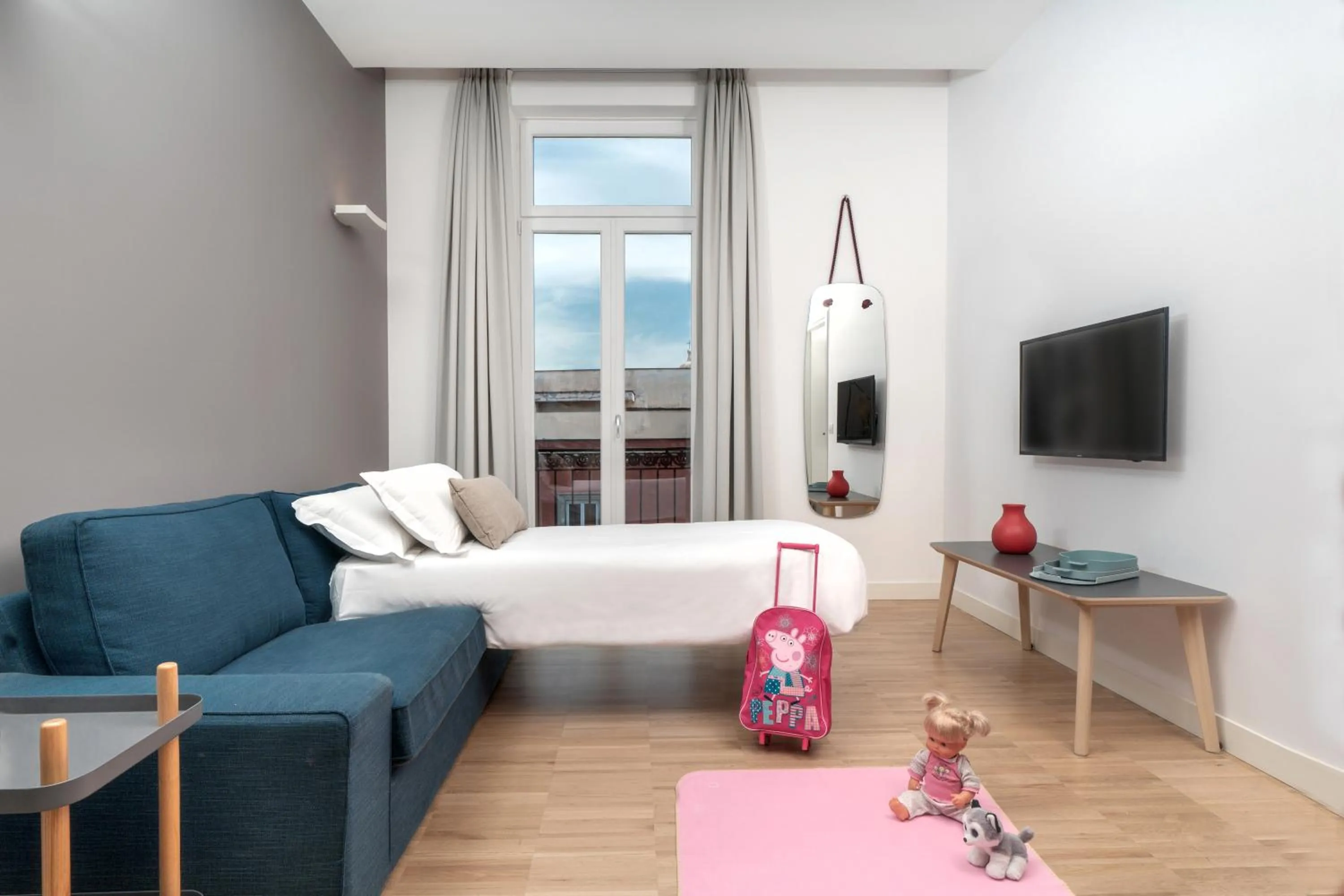 Seating area, Bed in Hotel Piazza Bellini & Apartments