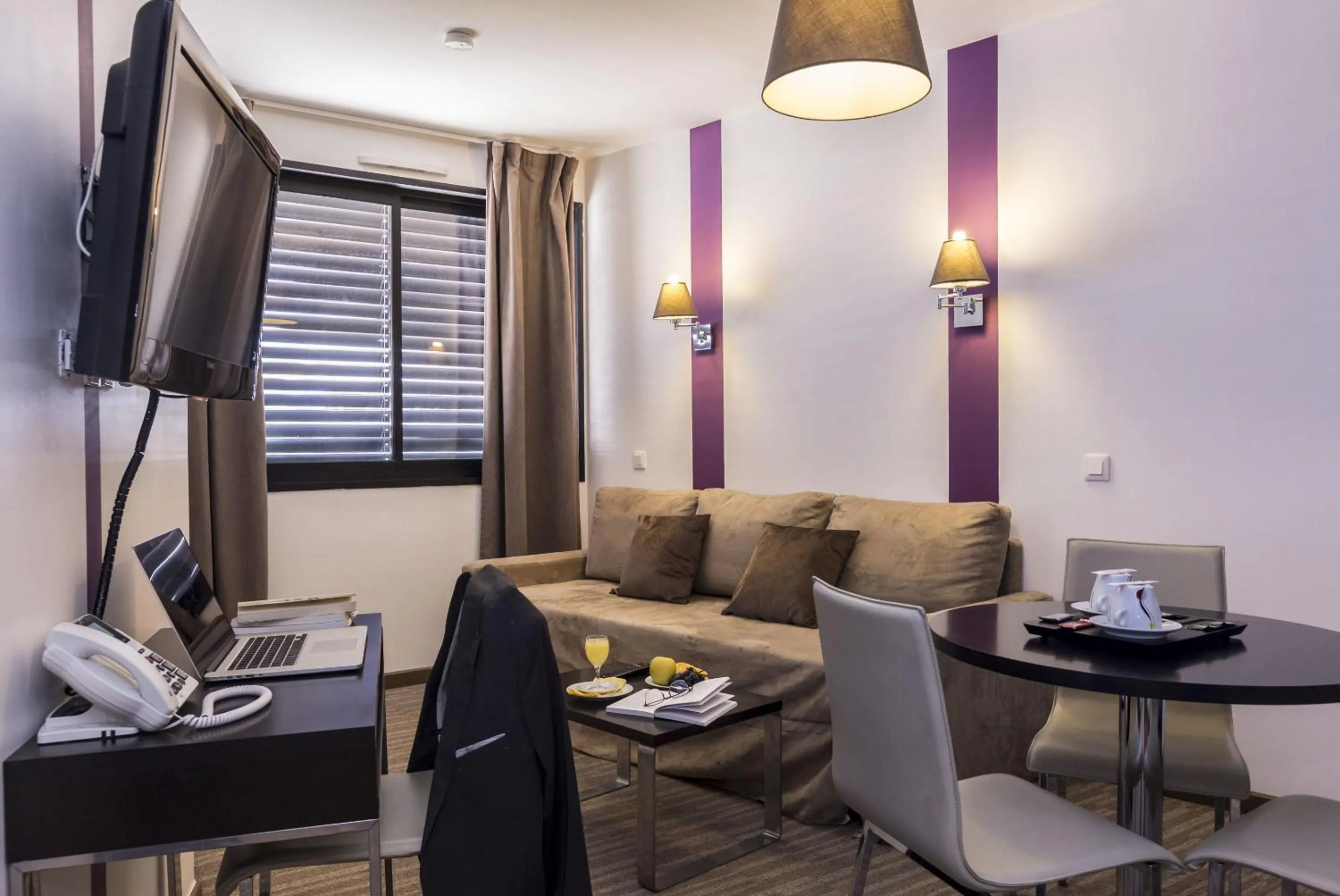 Living room in Zenitude Swiss Apparthotels