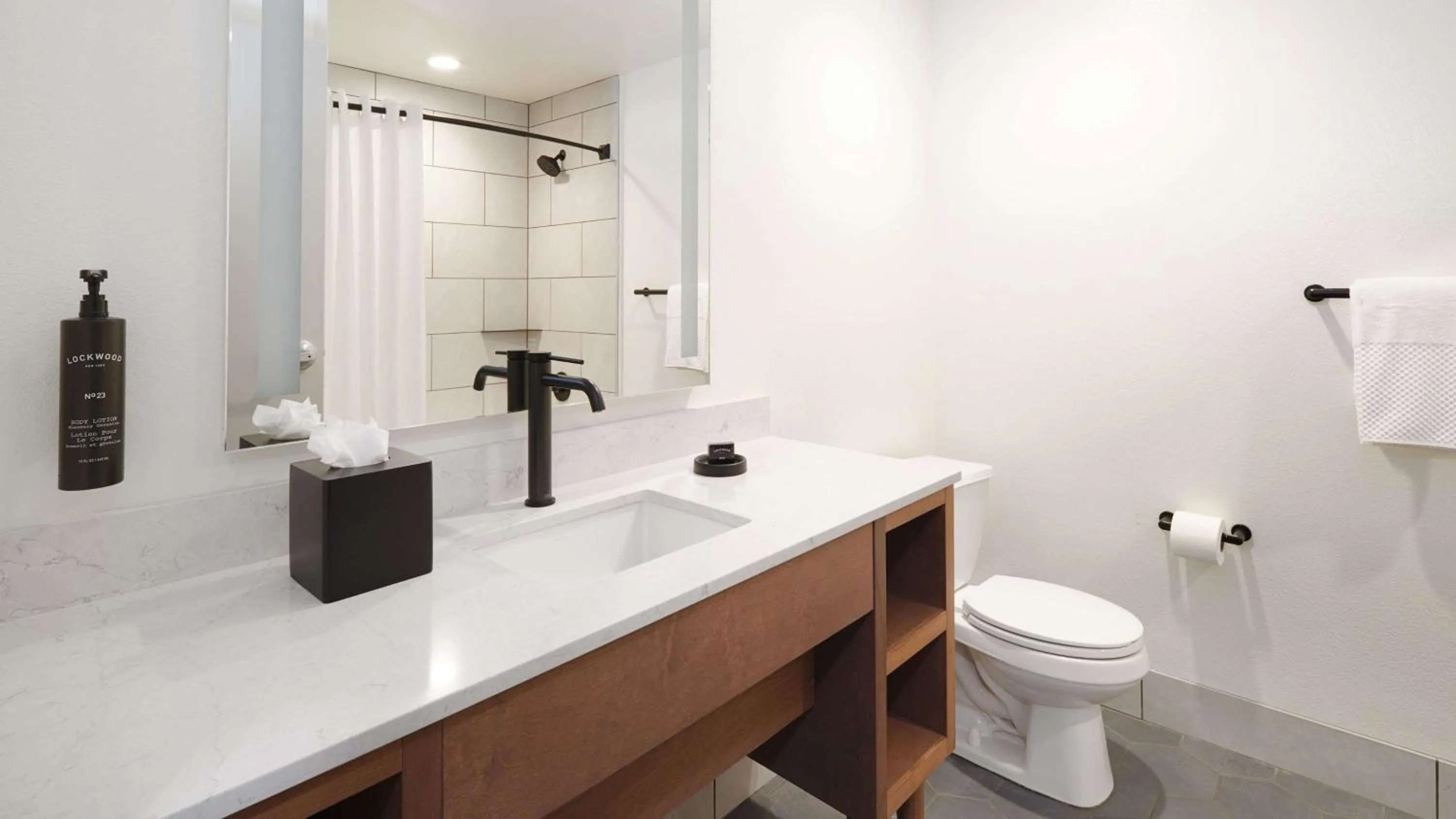 Bathroom in River's Edge Hotel Portland, Tapestry Collection by Hilton